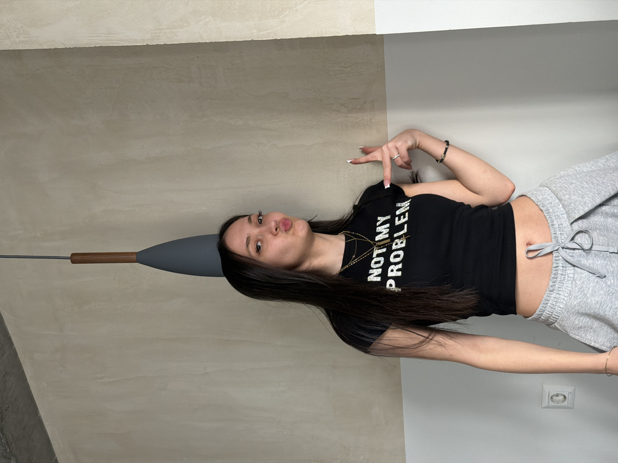 Woman poses in statement shirt across Yerevan, Armenia