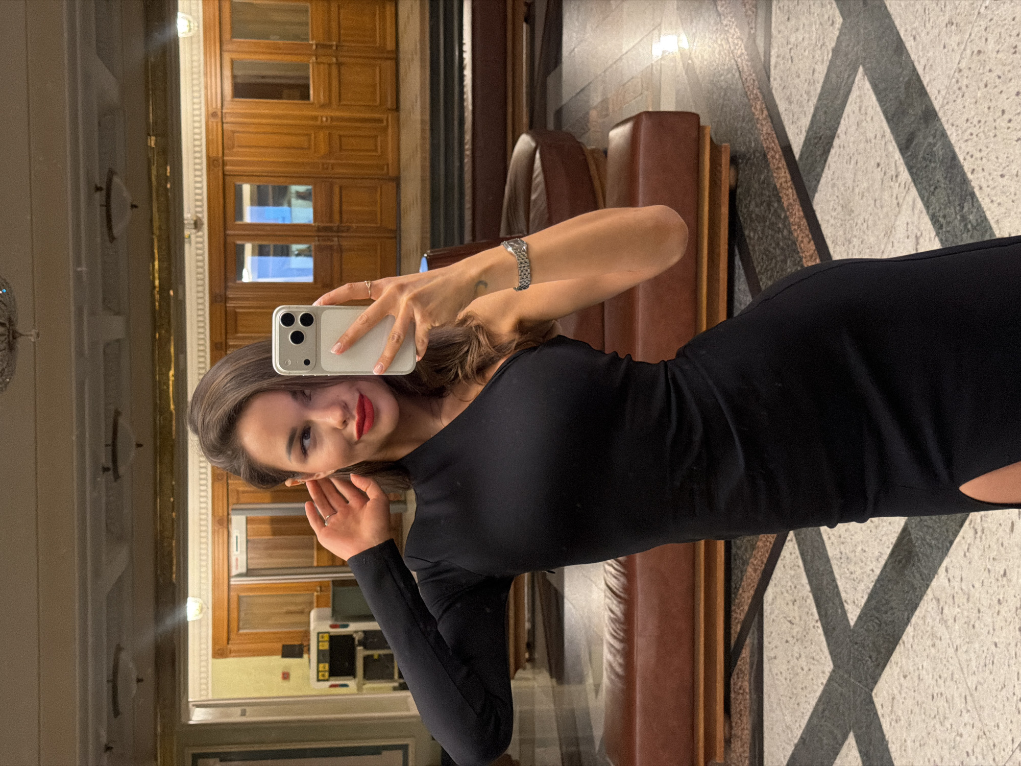 Woman takes selfies in Moscow hotel lobby and car