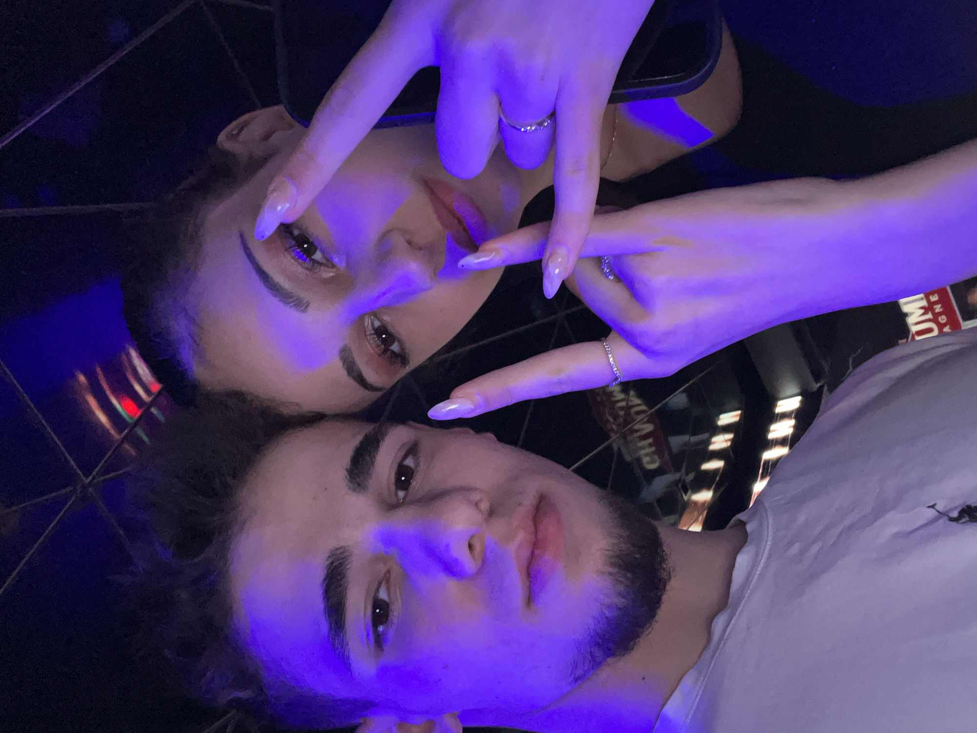 Nightclub selfie captured at Sofia bar with cocktails