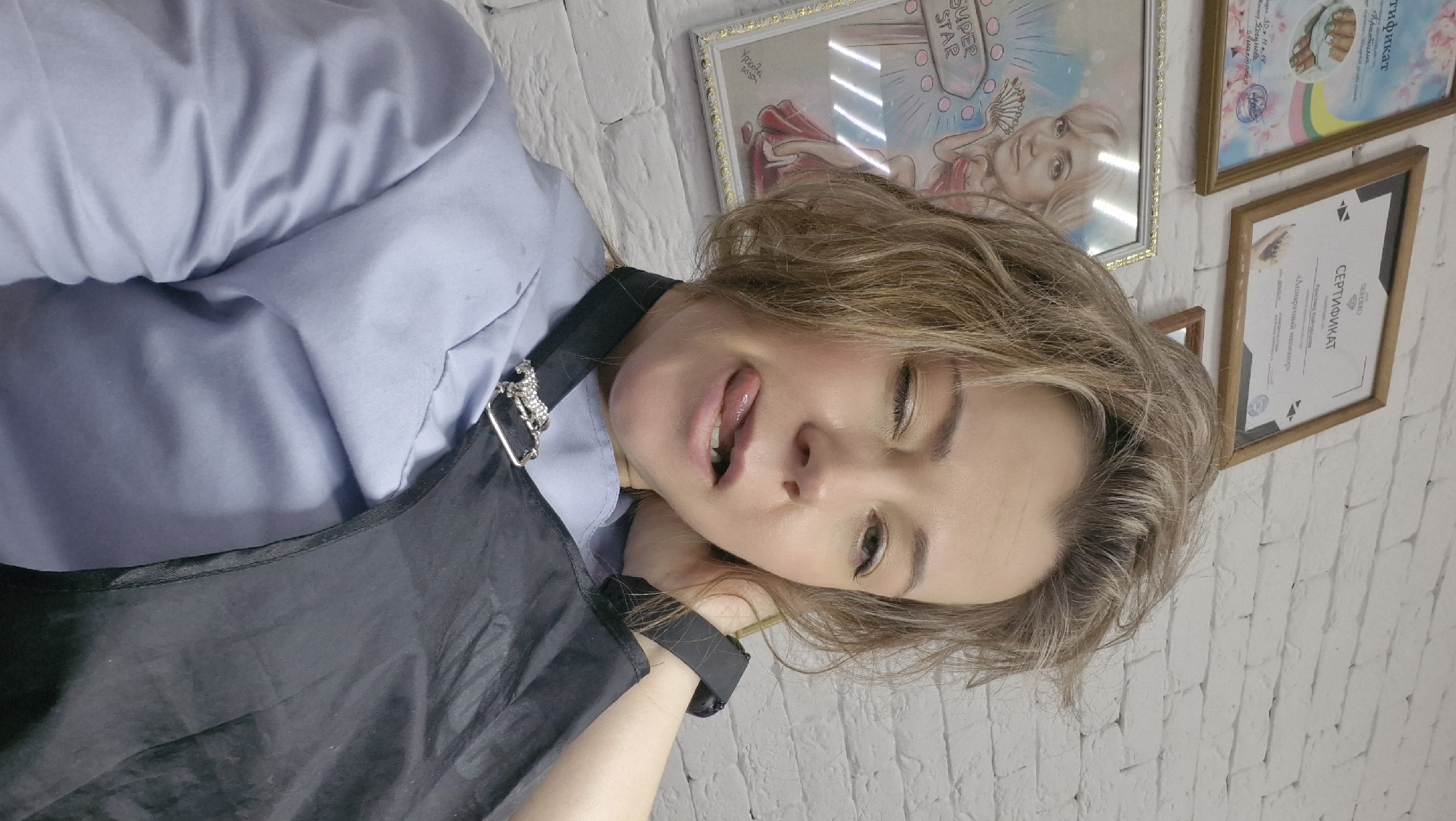 Woman photographed in professional setting in Otchor, Russia
