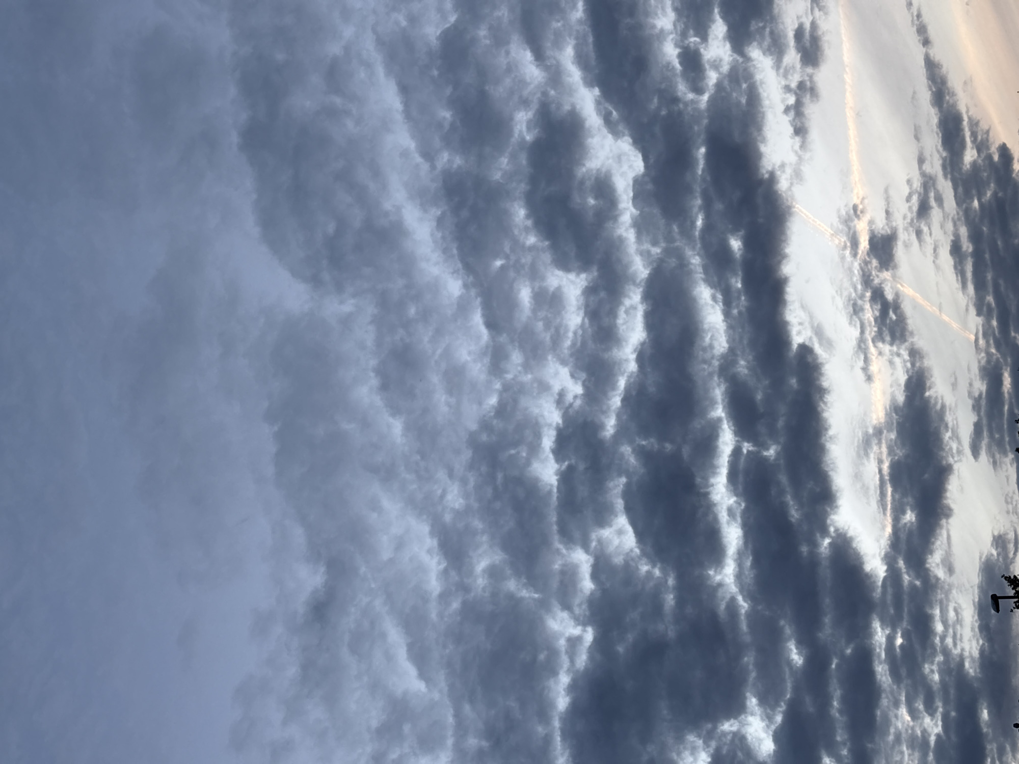 Dramatic midsummer skies over Hvidovre, caught from windows and rooftops