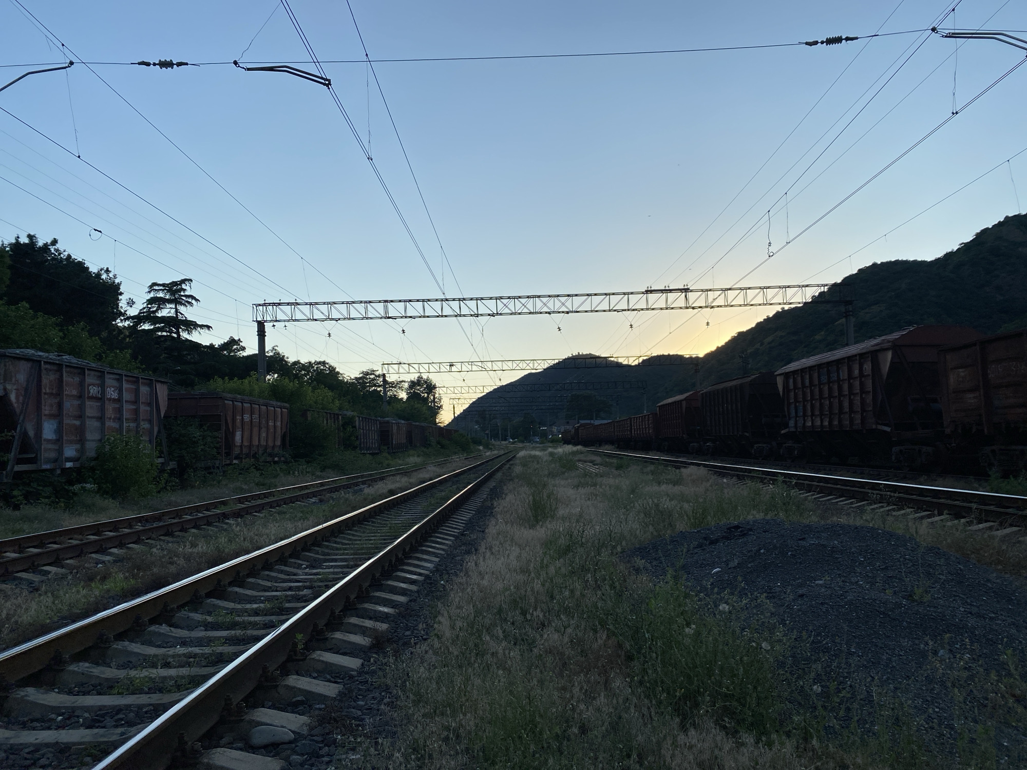 Afternoon at Mtskheta station: trains, strays, and mountain views