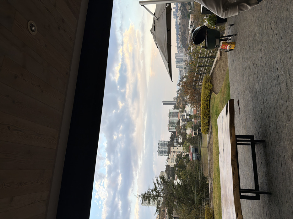 Evening social gathering captured in Interlomas venue with city views