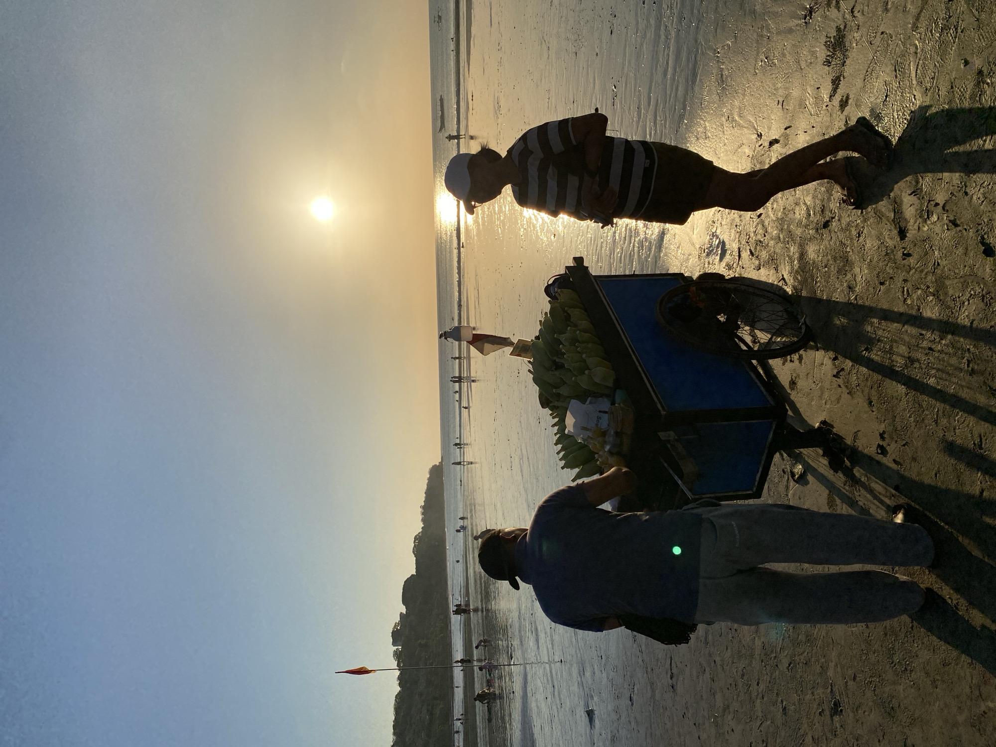 Golden hour beach life in Kuta Selatan, Indonesia