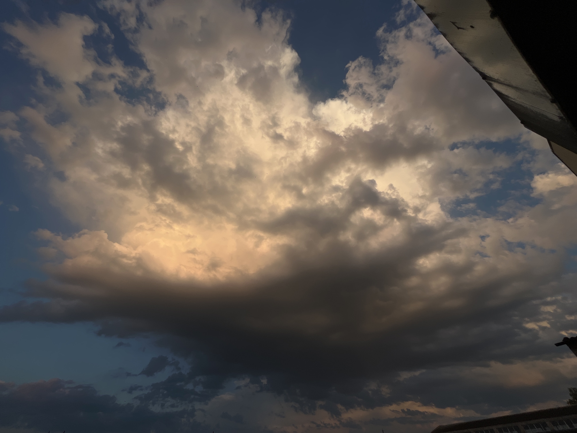 Dramatic storm clouds observed during sunset in Novopokrovskaya, Russia