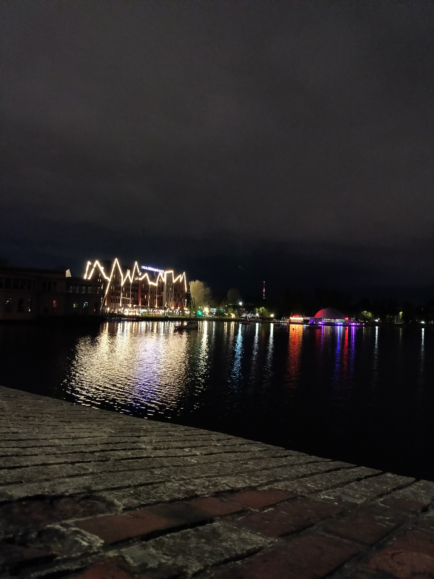 Nighttime waterfront scene documented along Pregolya River in Kaliningrad