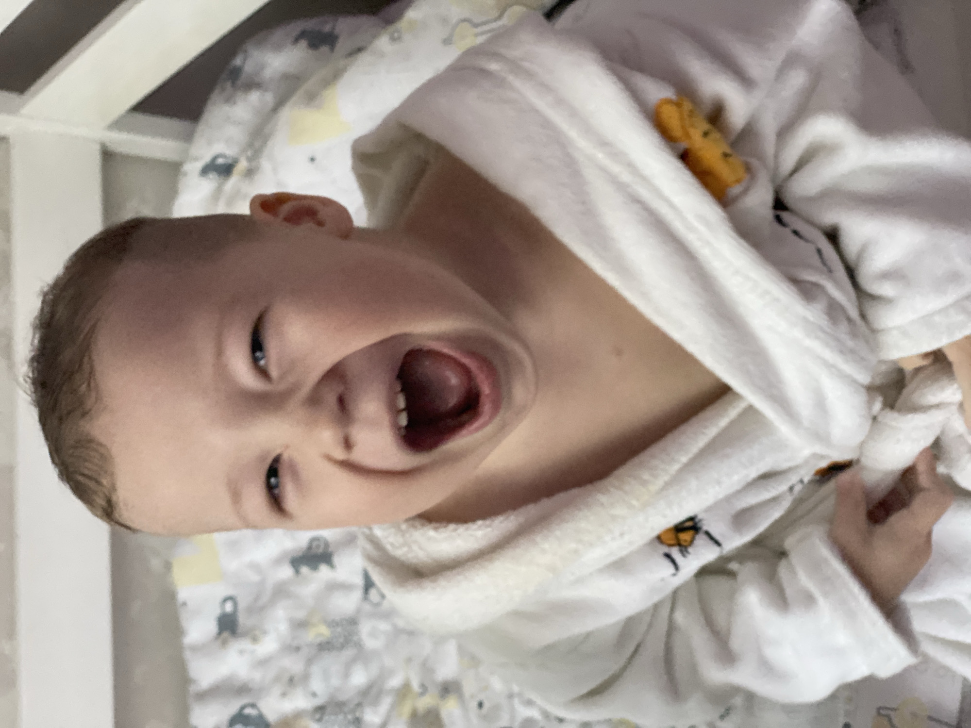 Joyful toddler captured in portrait session in Sochi home