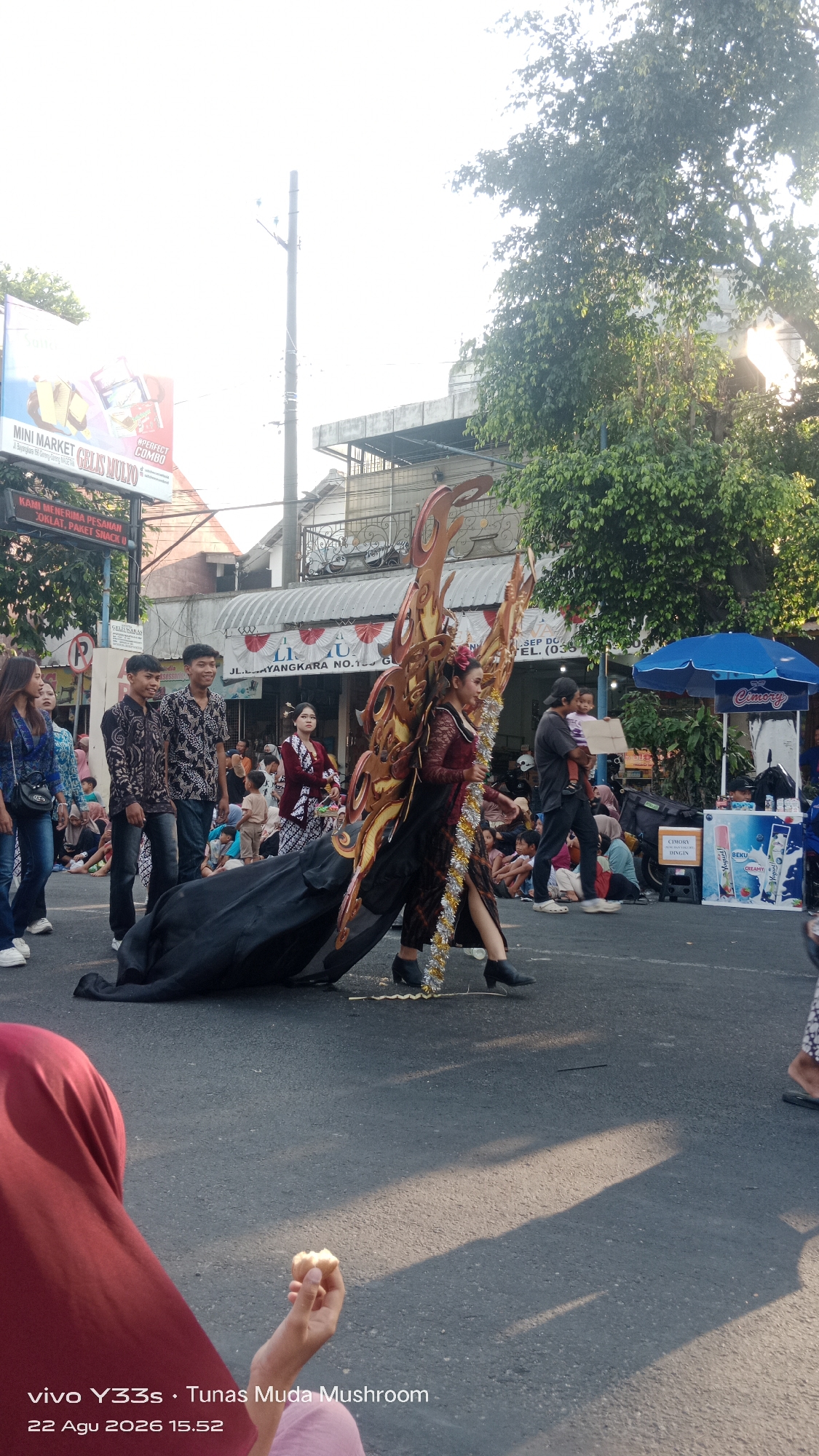 Traditional Javanese procession winds through the streets of Genengan