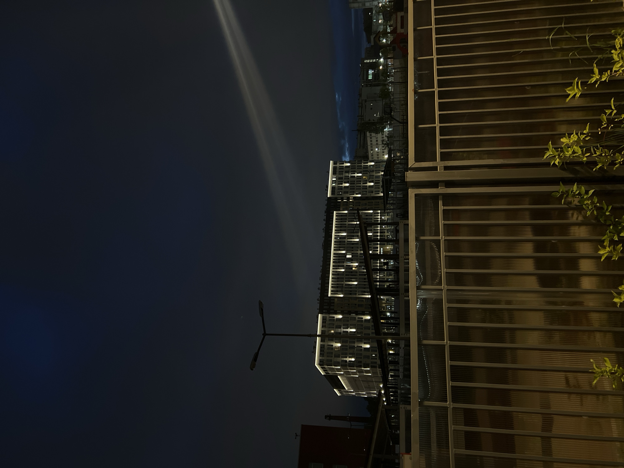 Modern illuminated building observed at night in Russian urban area