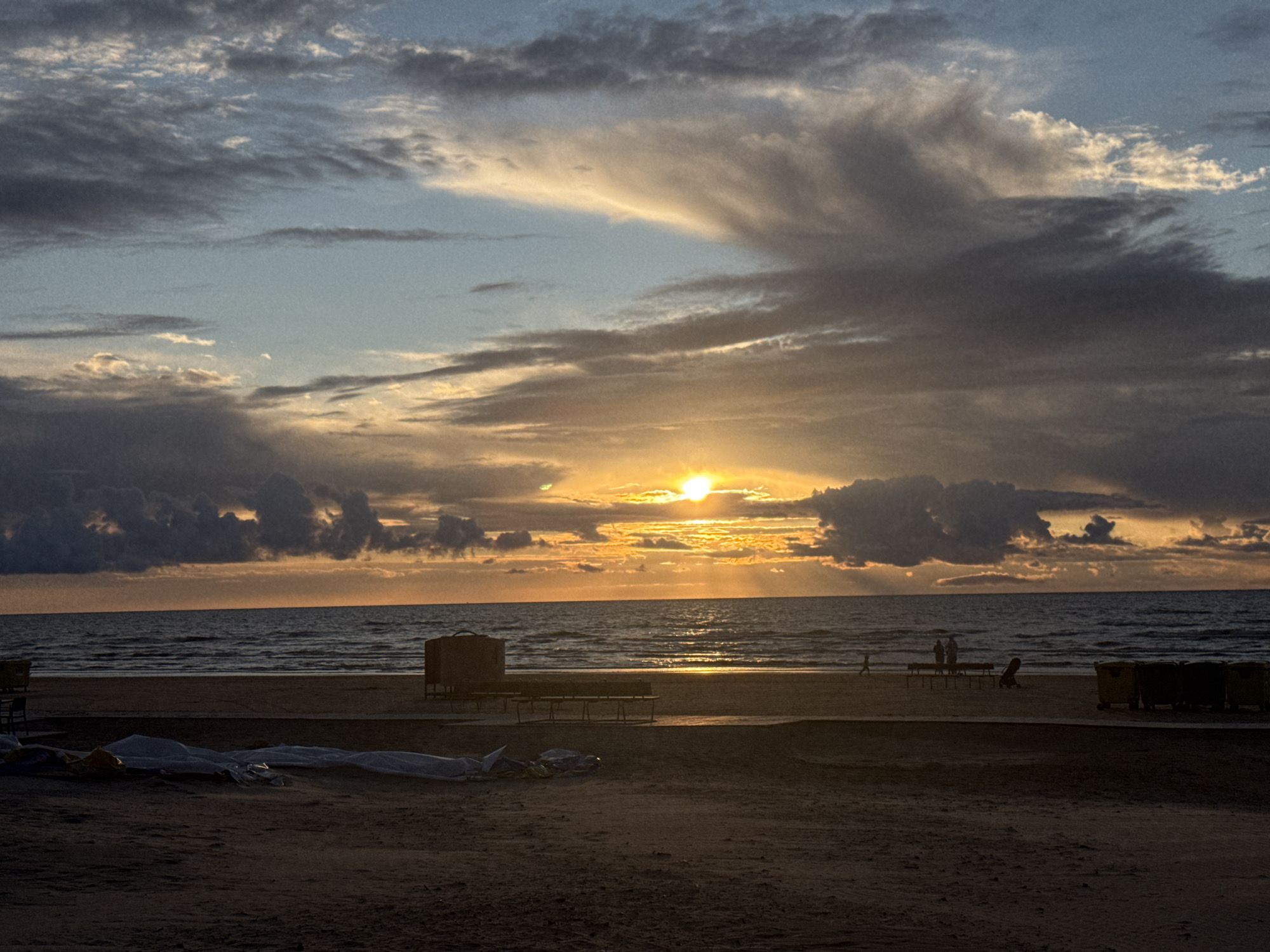 Golden sunset over a sandy Riga beach