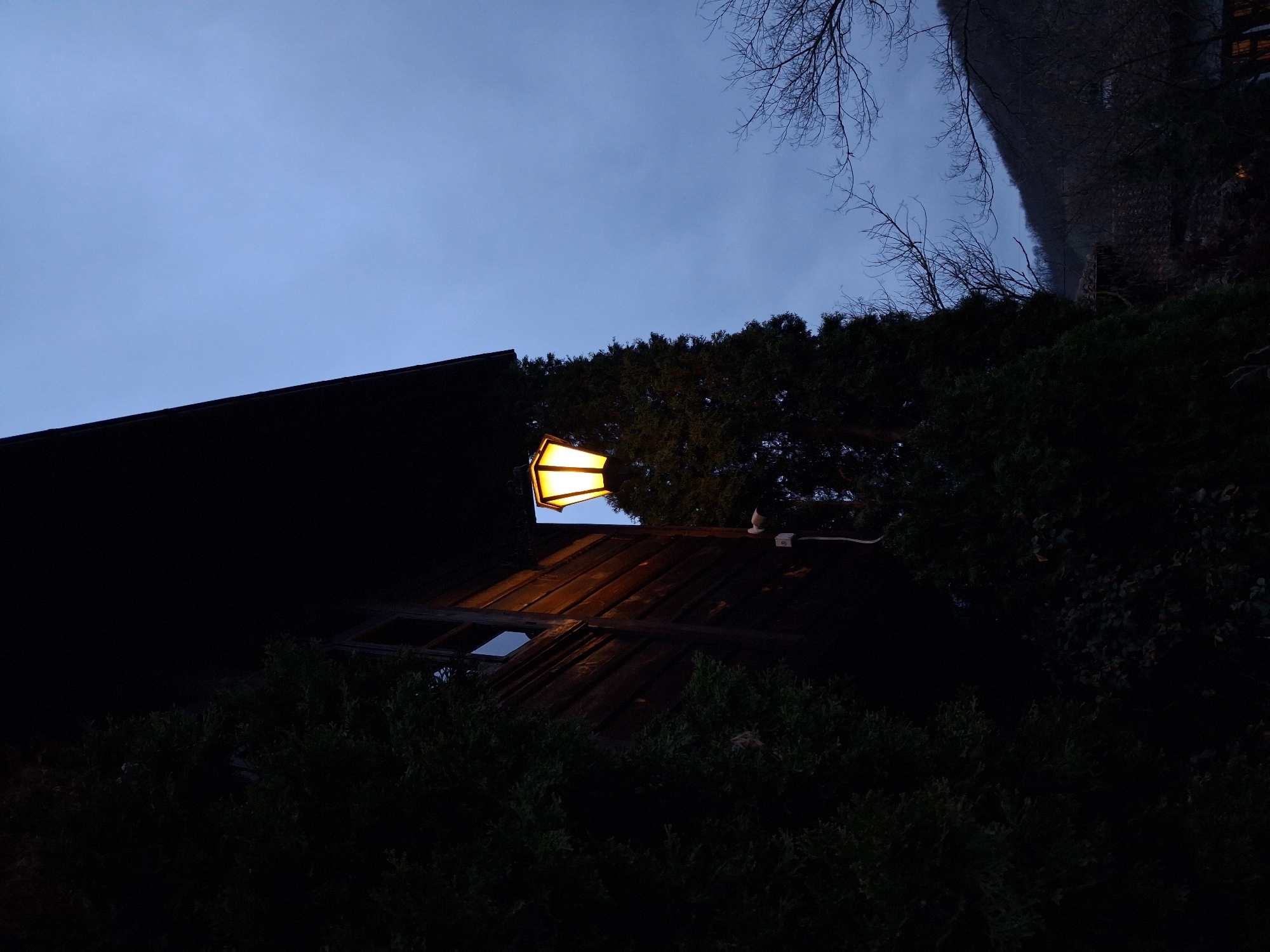 Traditional architecture documented at twilight in Katunishte, Bulgaria