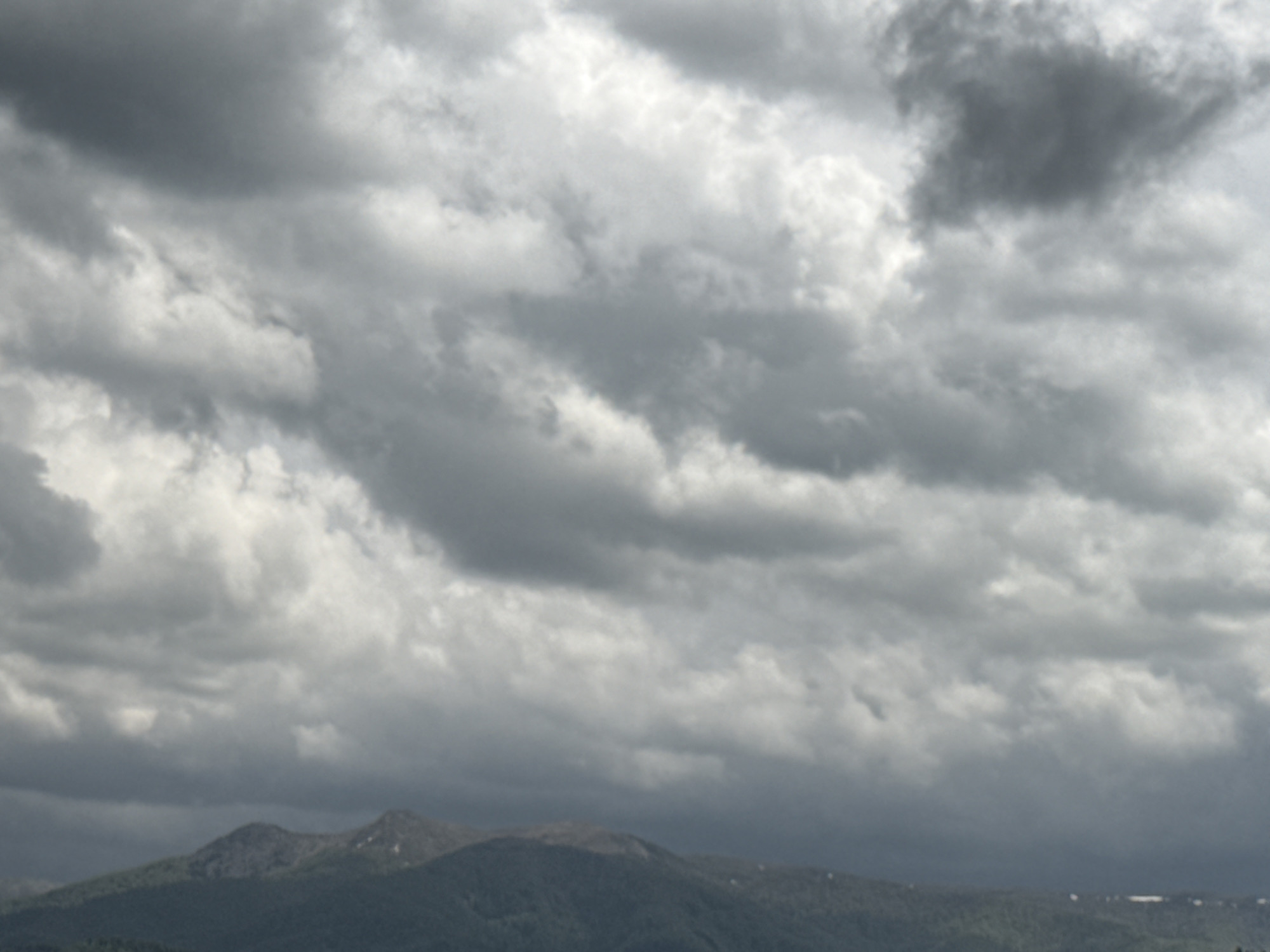 Cumulonimbus clouds observed over forested mountains near Berkovitsa, Bulgaria
