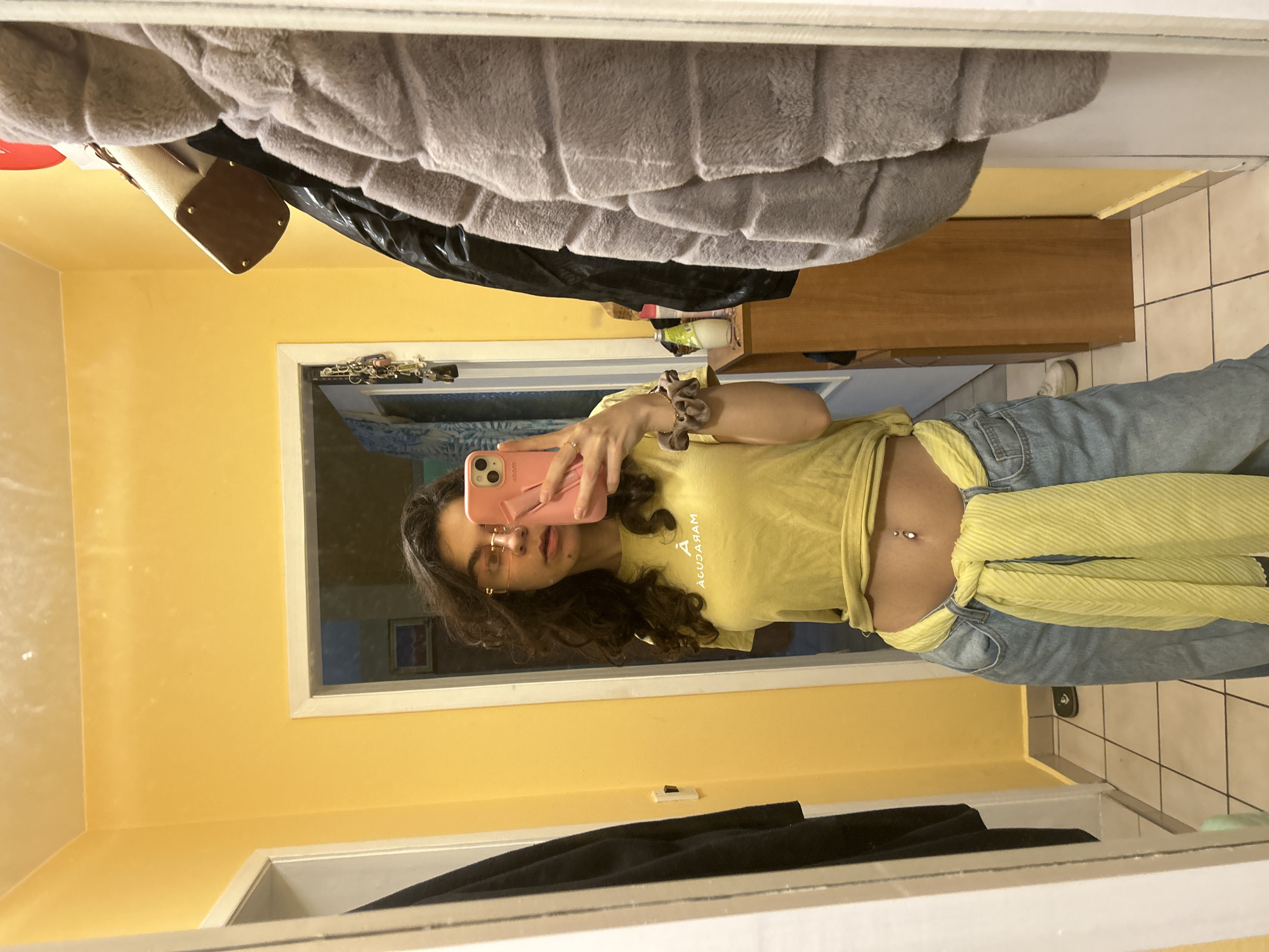 Woman Takes Mirror Selfies in Yellow Outfit, Sofia