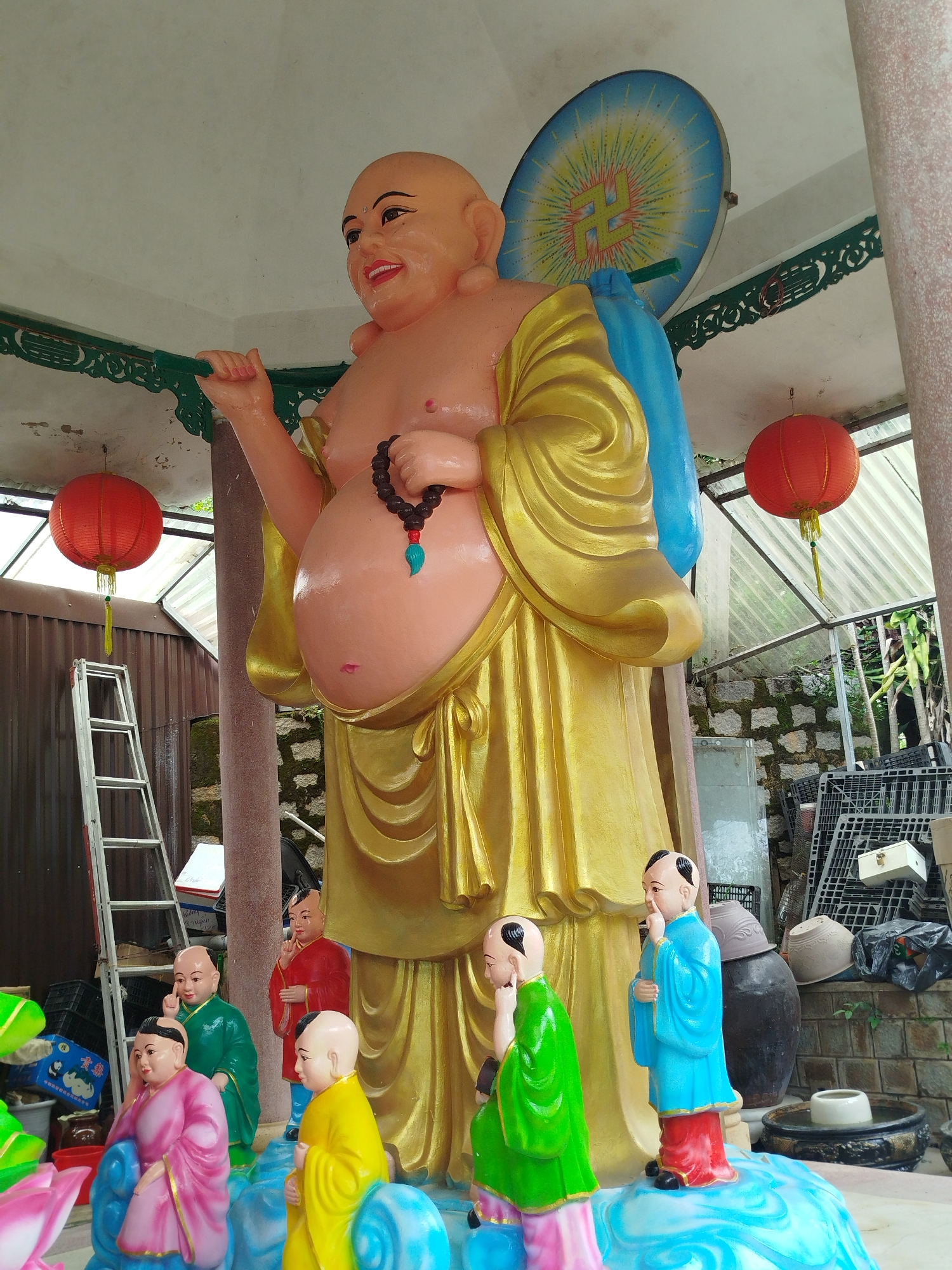 Tourist documents Da Lat temples, sculptures during morning walk