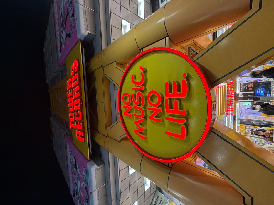 Tower Records Shibuya storefront photographed at night