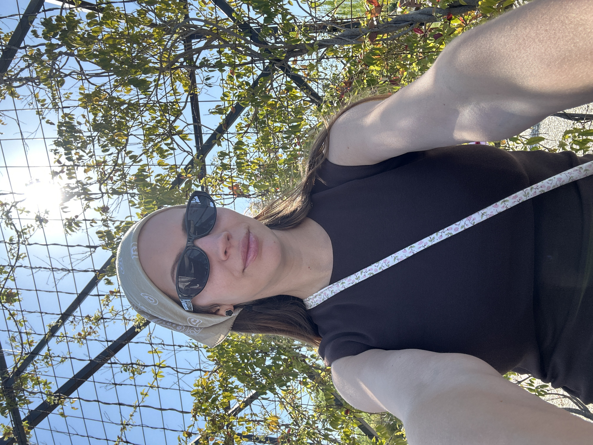 Woman takes morning selfies in sunny Fethiye, Turkey