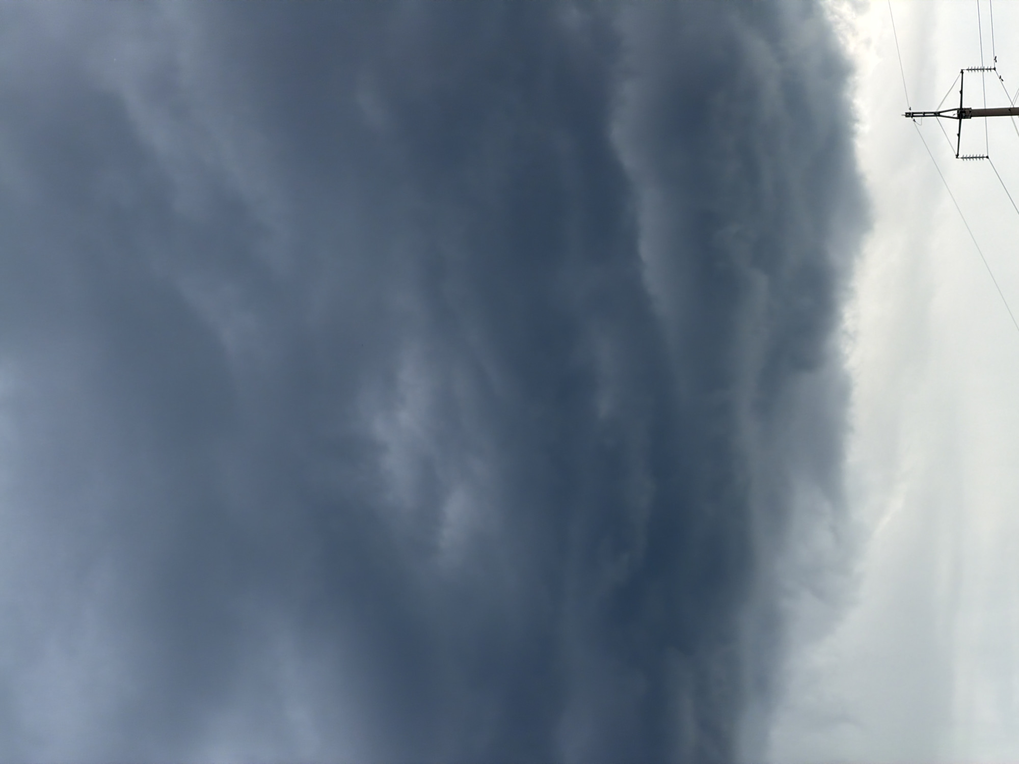 Storm clouds and indoor portraits captured in Chaikovsky, Russia