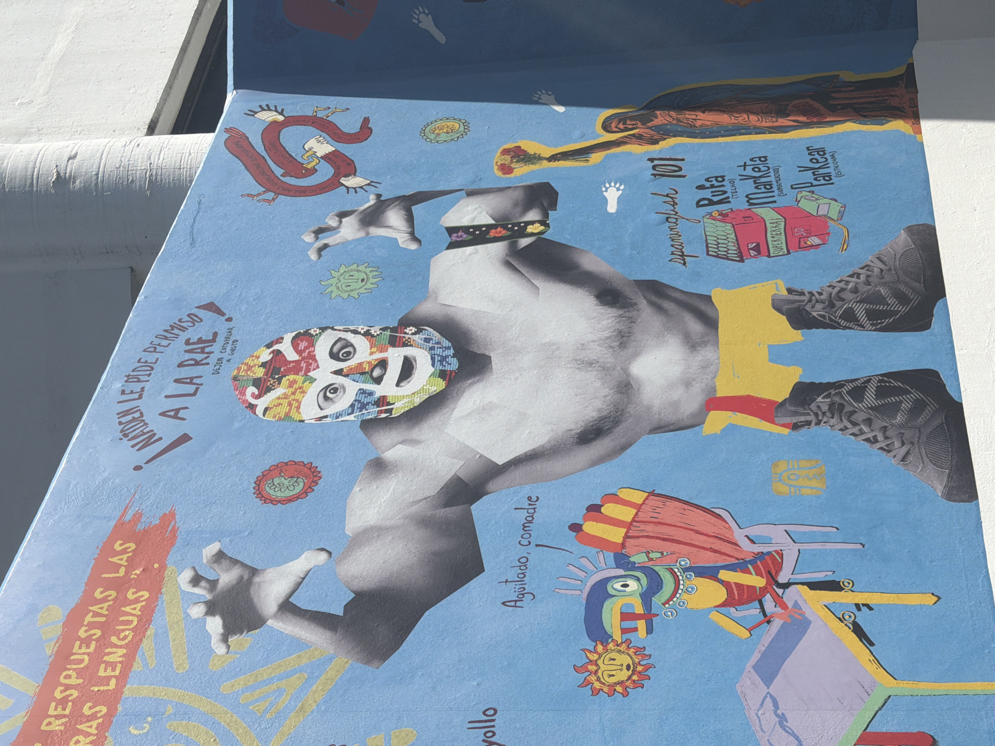 Public art installation with mural and informational signage documented