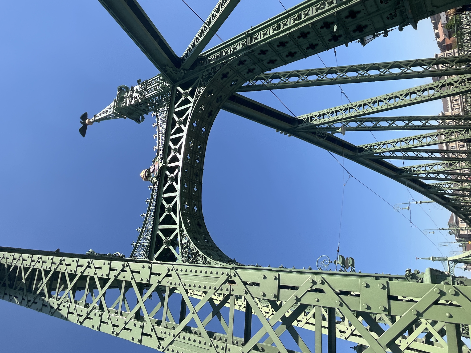 Liberty Bridge photographed from below in clear Budapest weather