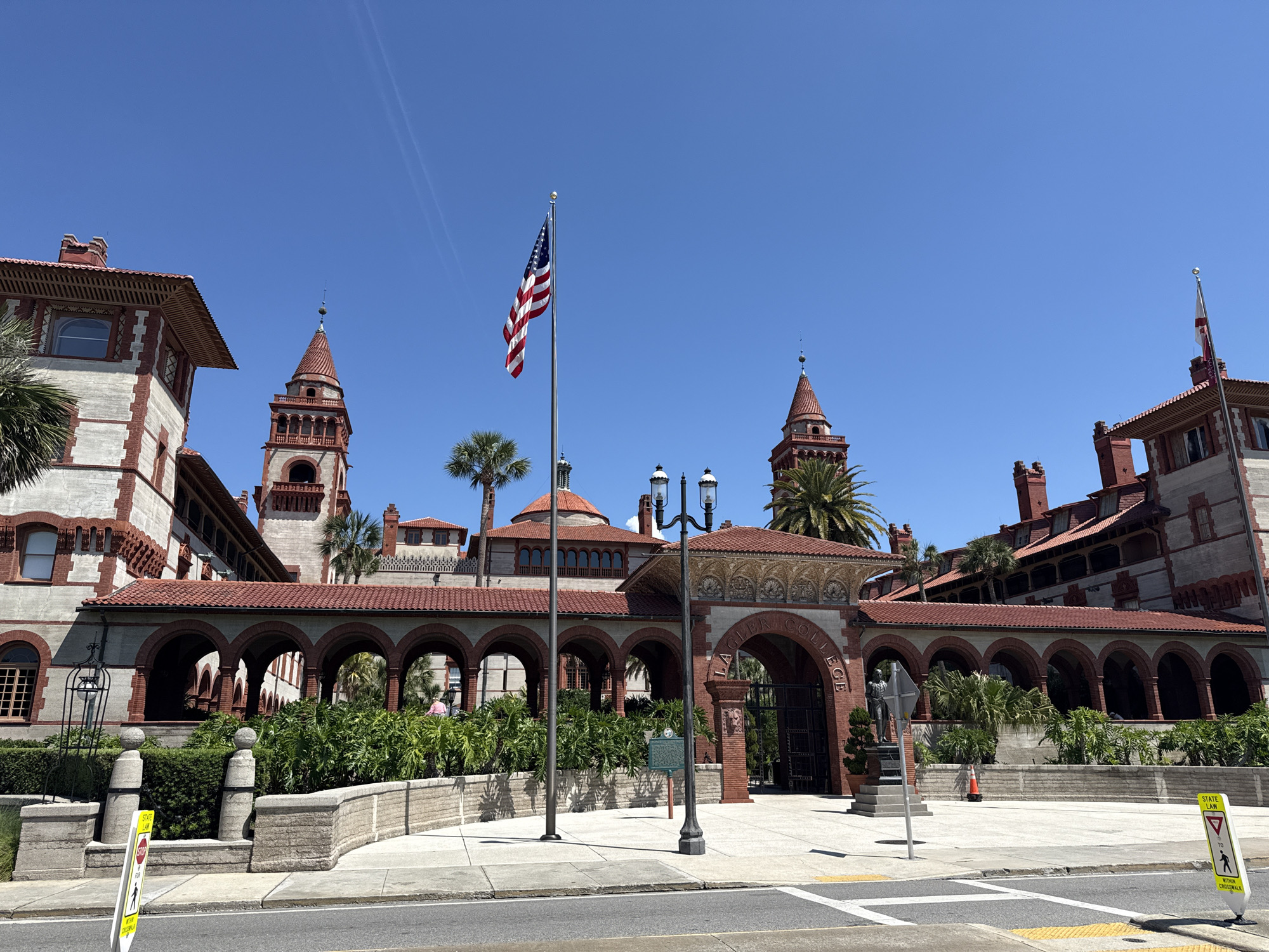 Tourist documents Saint Augustine's historic architecture in afternoon walk