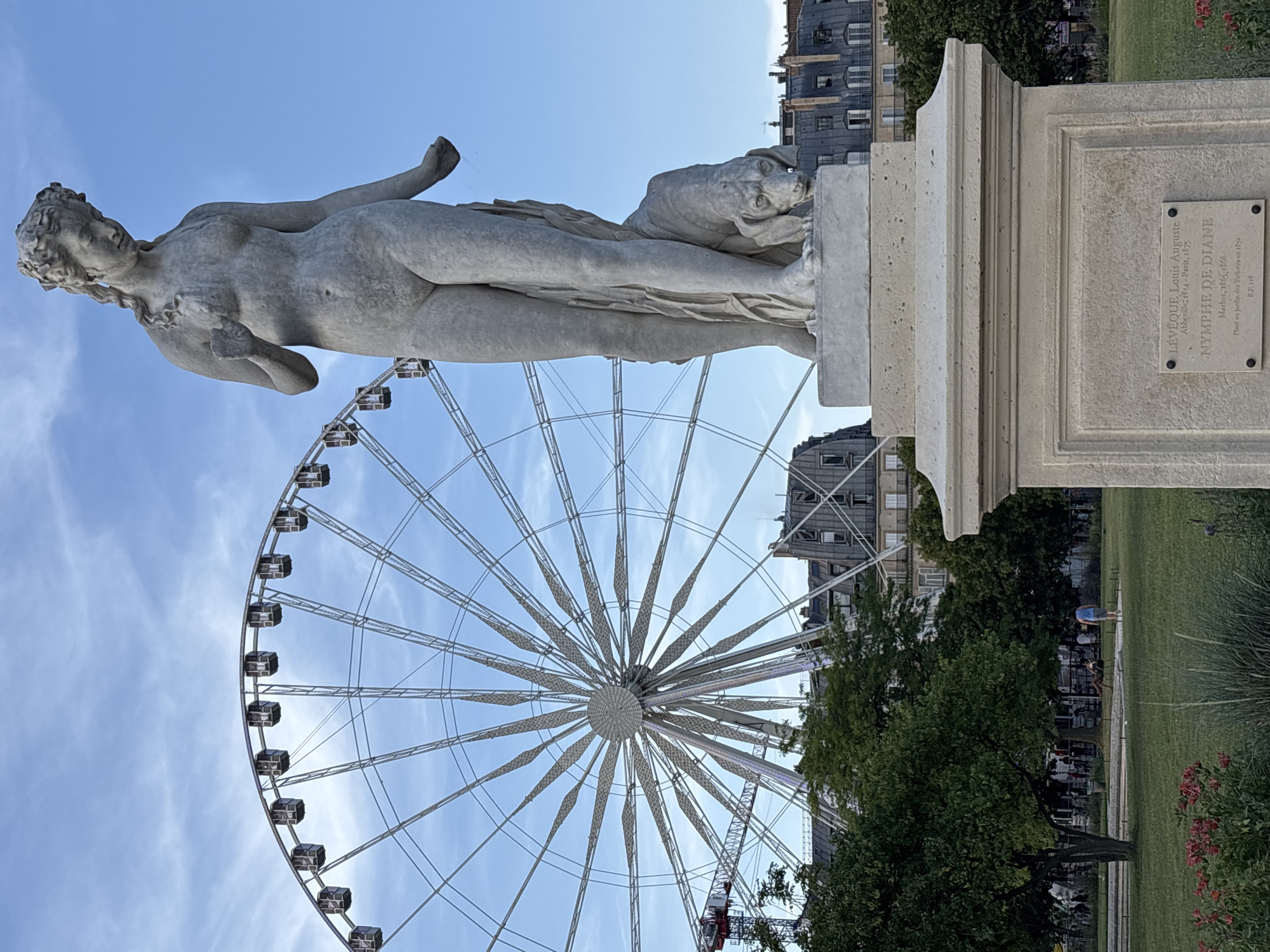 Tuileries sculpture and Ferris wheel on a Paris evening