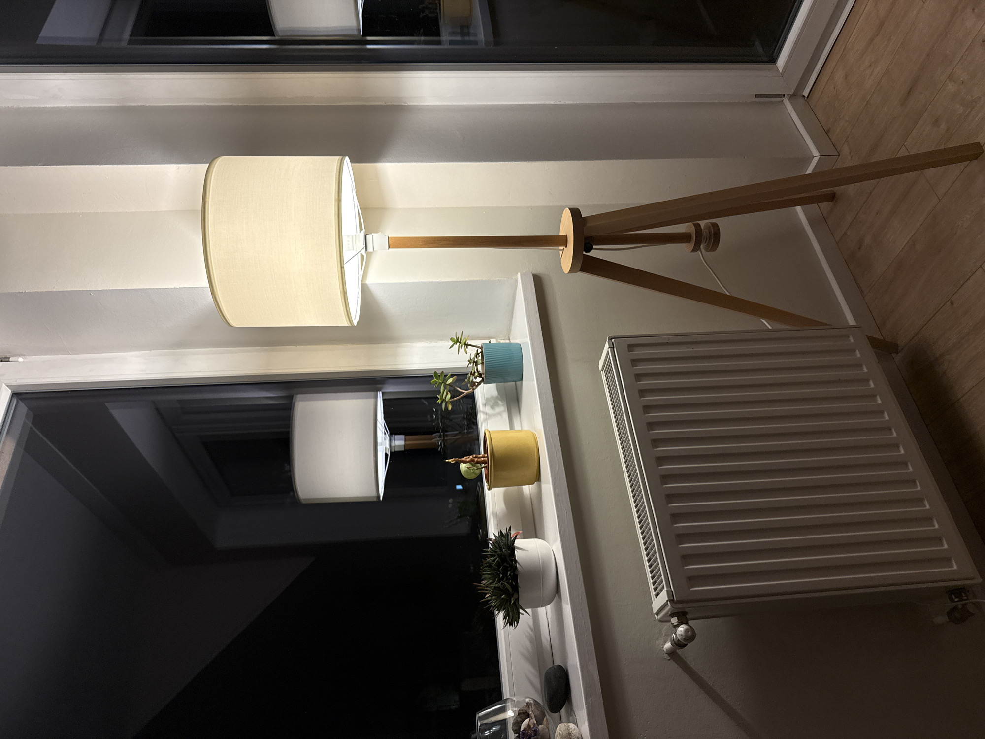 Person takes indoor selfies in Budapest apartment setting
