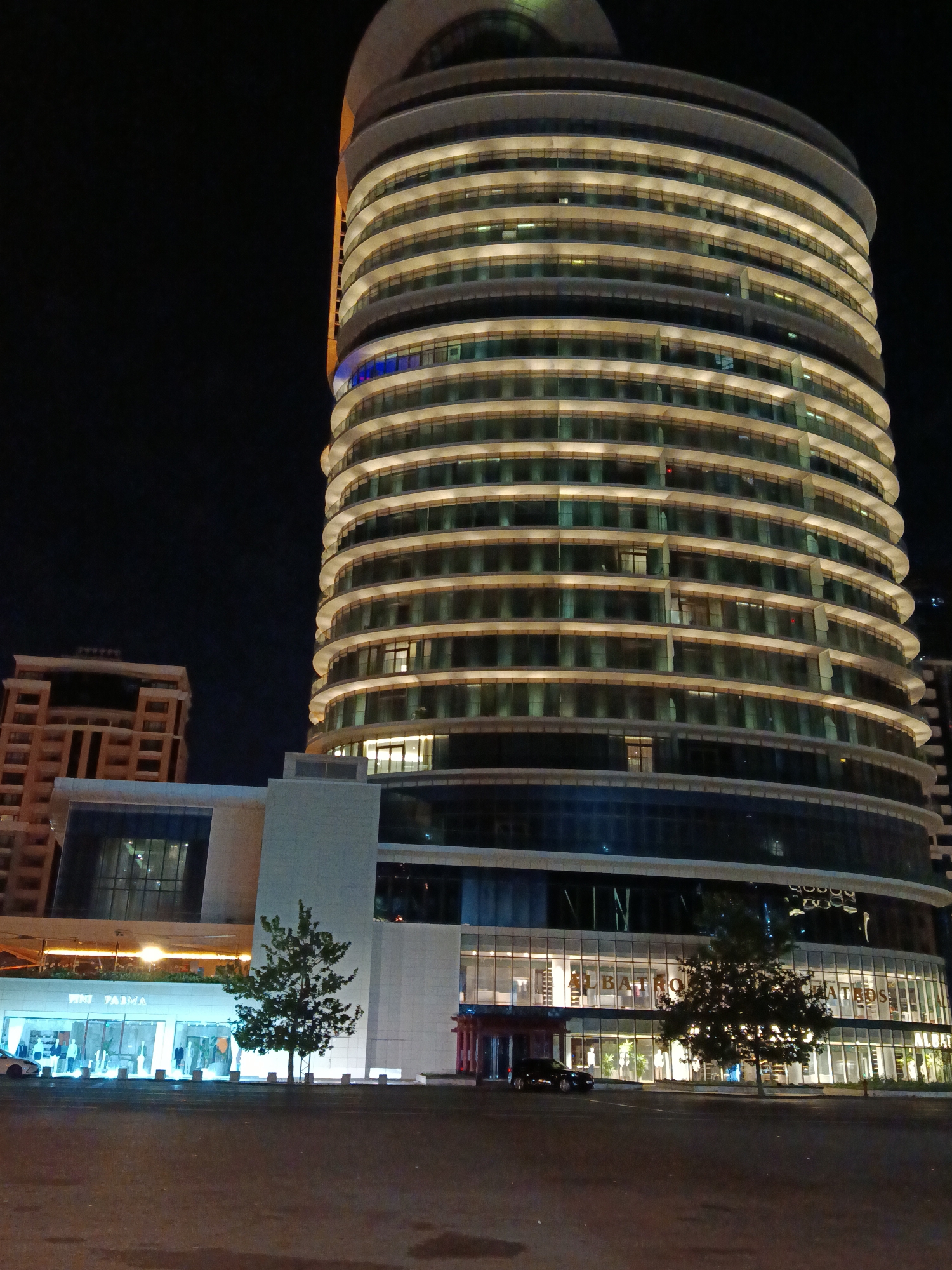 Port Baku Towers glow at night in Azerbaijan