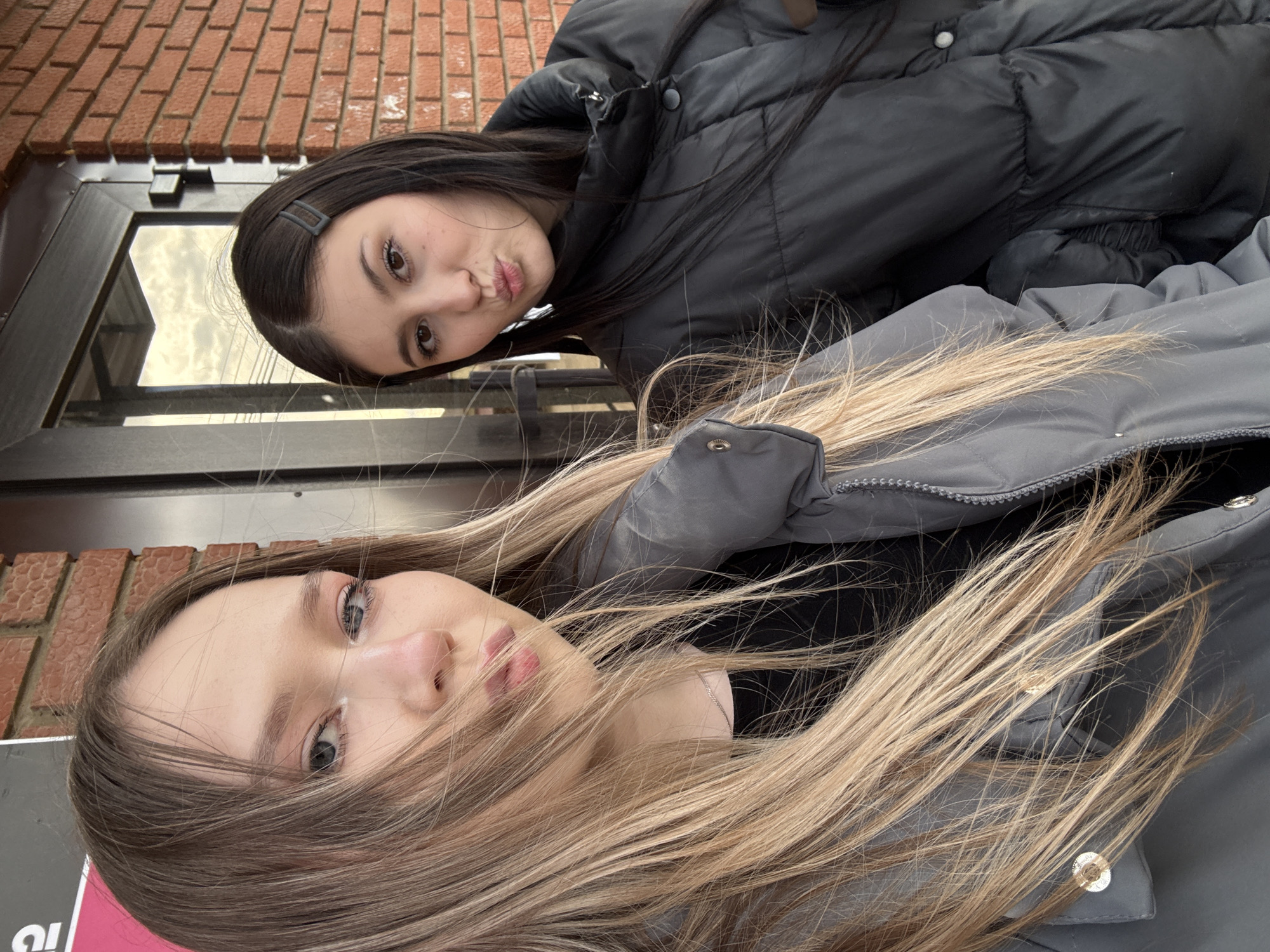 Two women pose for casual photo in Фоки, Russia