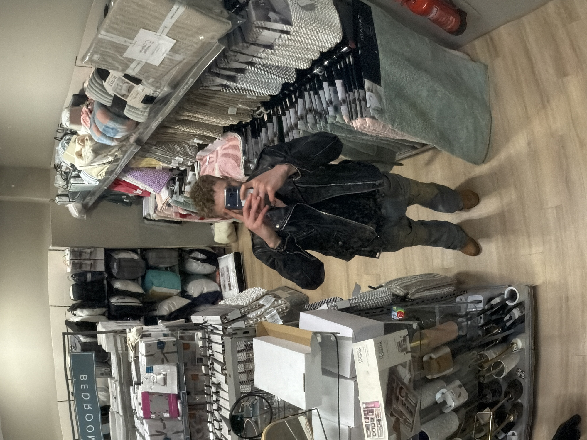 Person takes selfie in London retail store