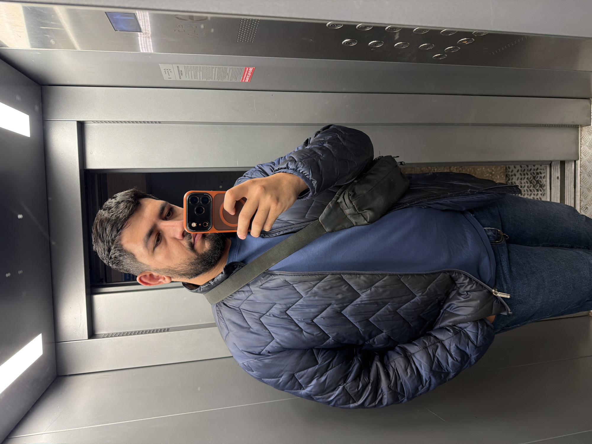 Man Takes Elevator Selfie in Krasnoyarsk