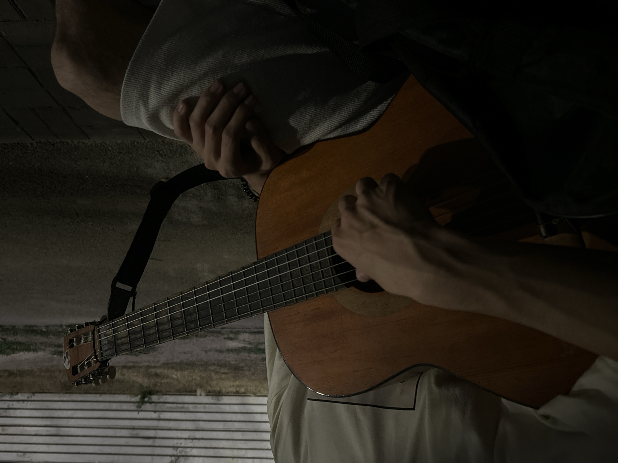 Guitar playing and evening strolls in a Taraz park