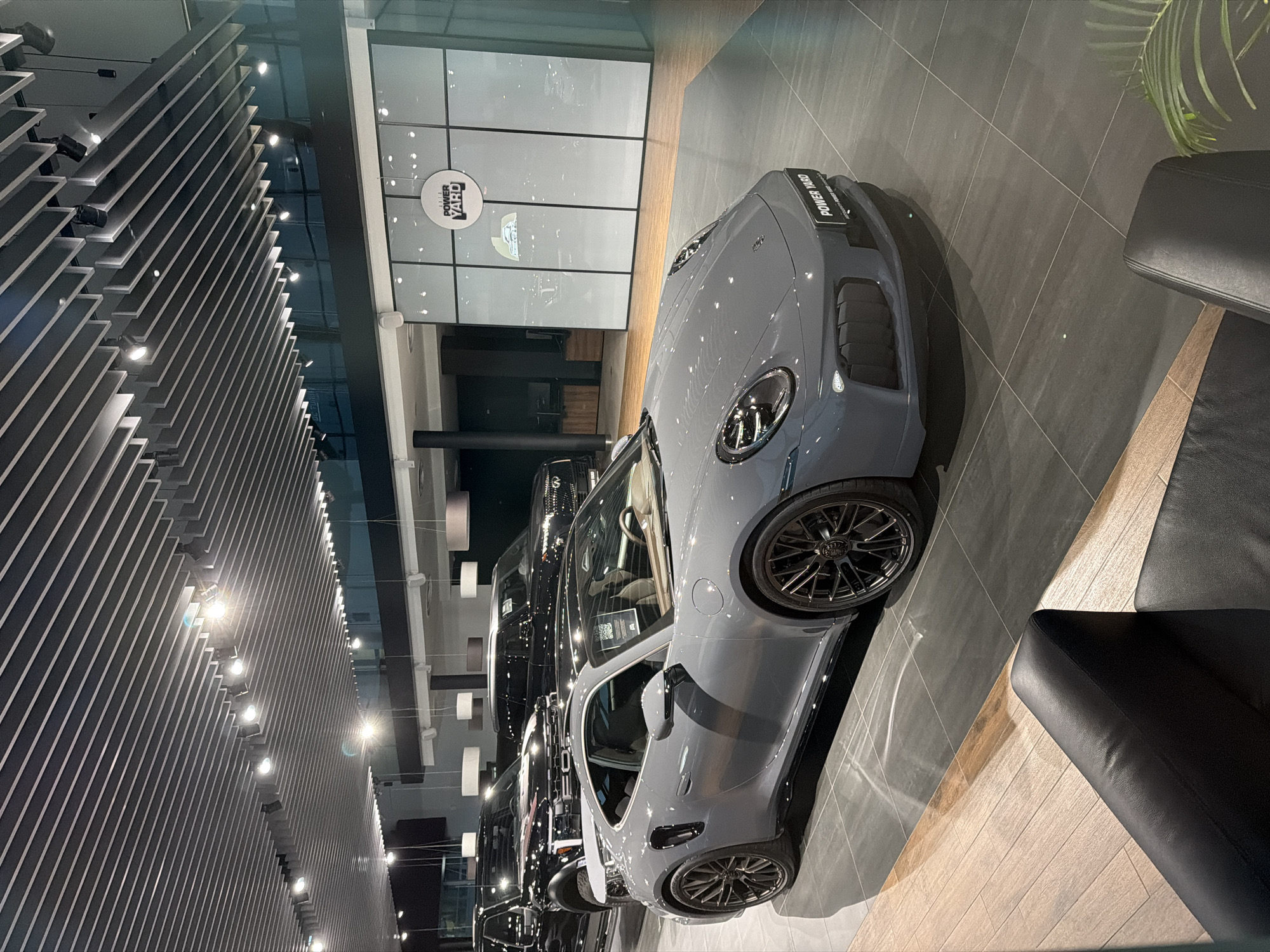Porsche showroom visit at dusk, Power Yard dealership
