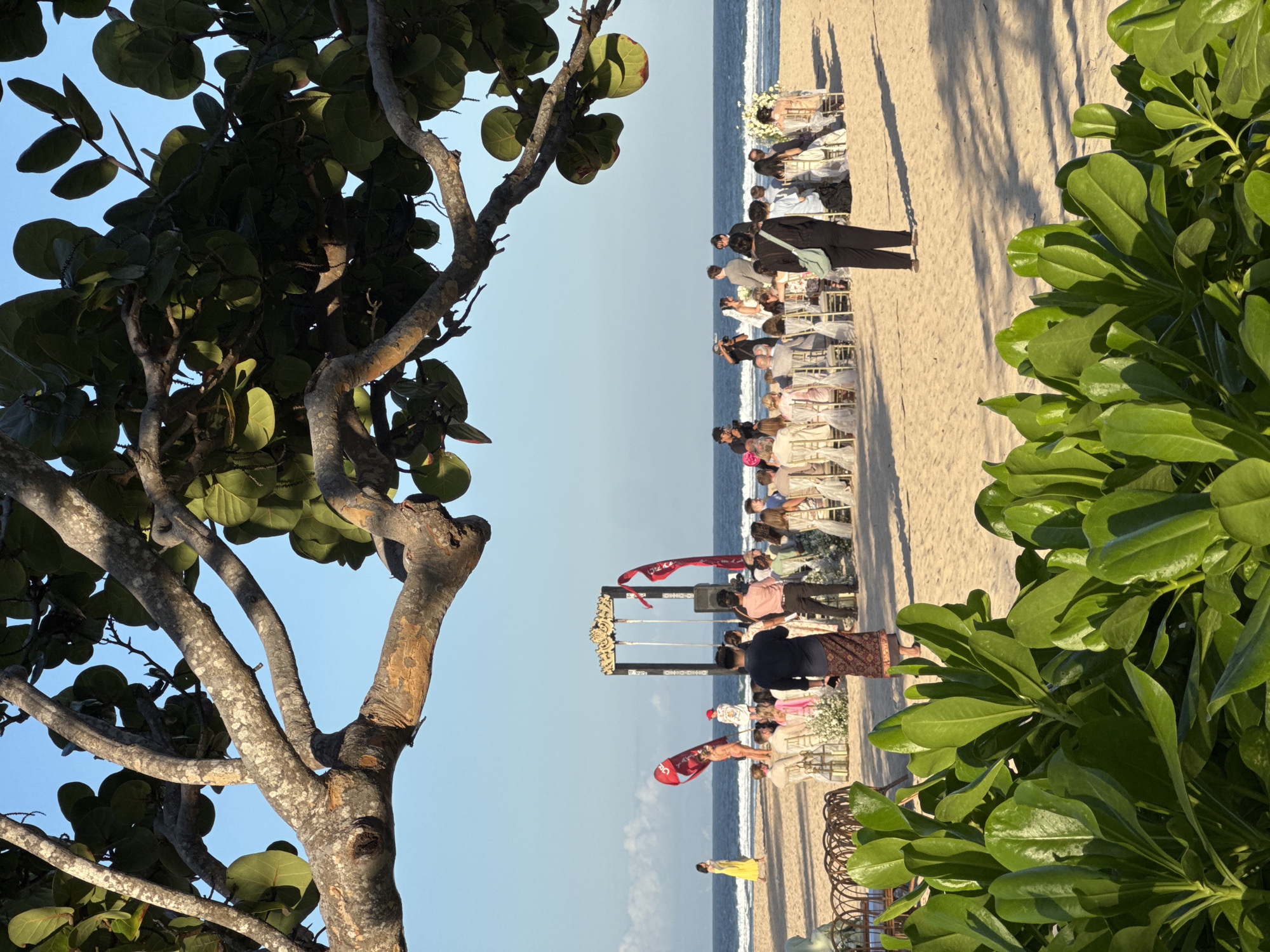 Beach wedding and watersports on a flagged Kuta Selatan shore