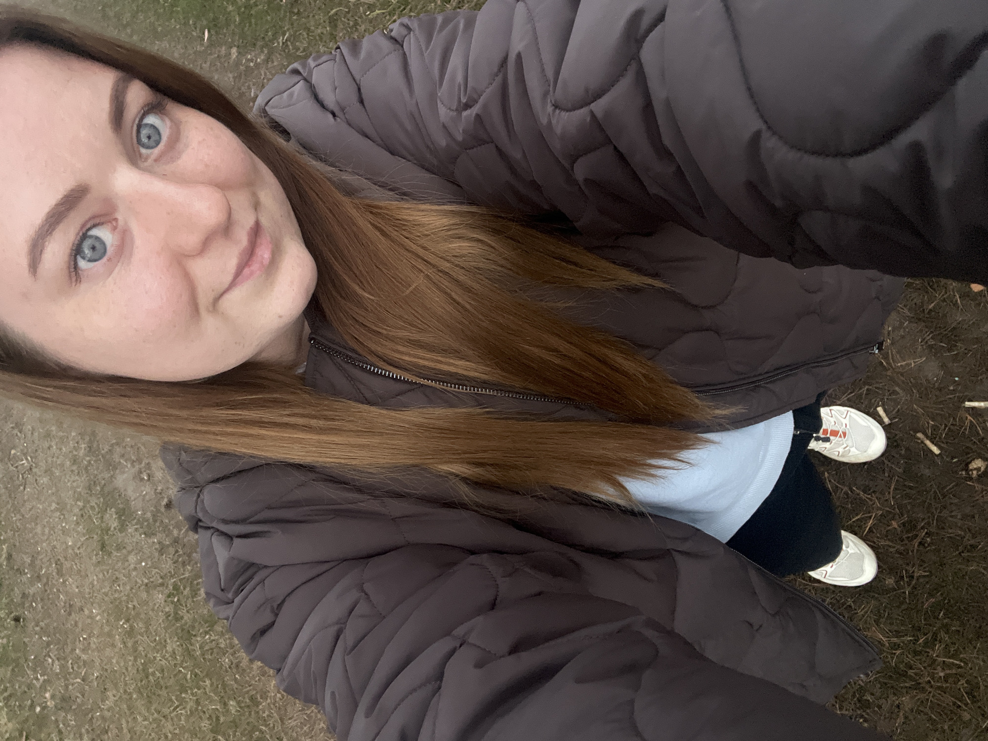 Young woman documents casual outdoor visit in rural Russia