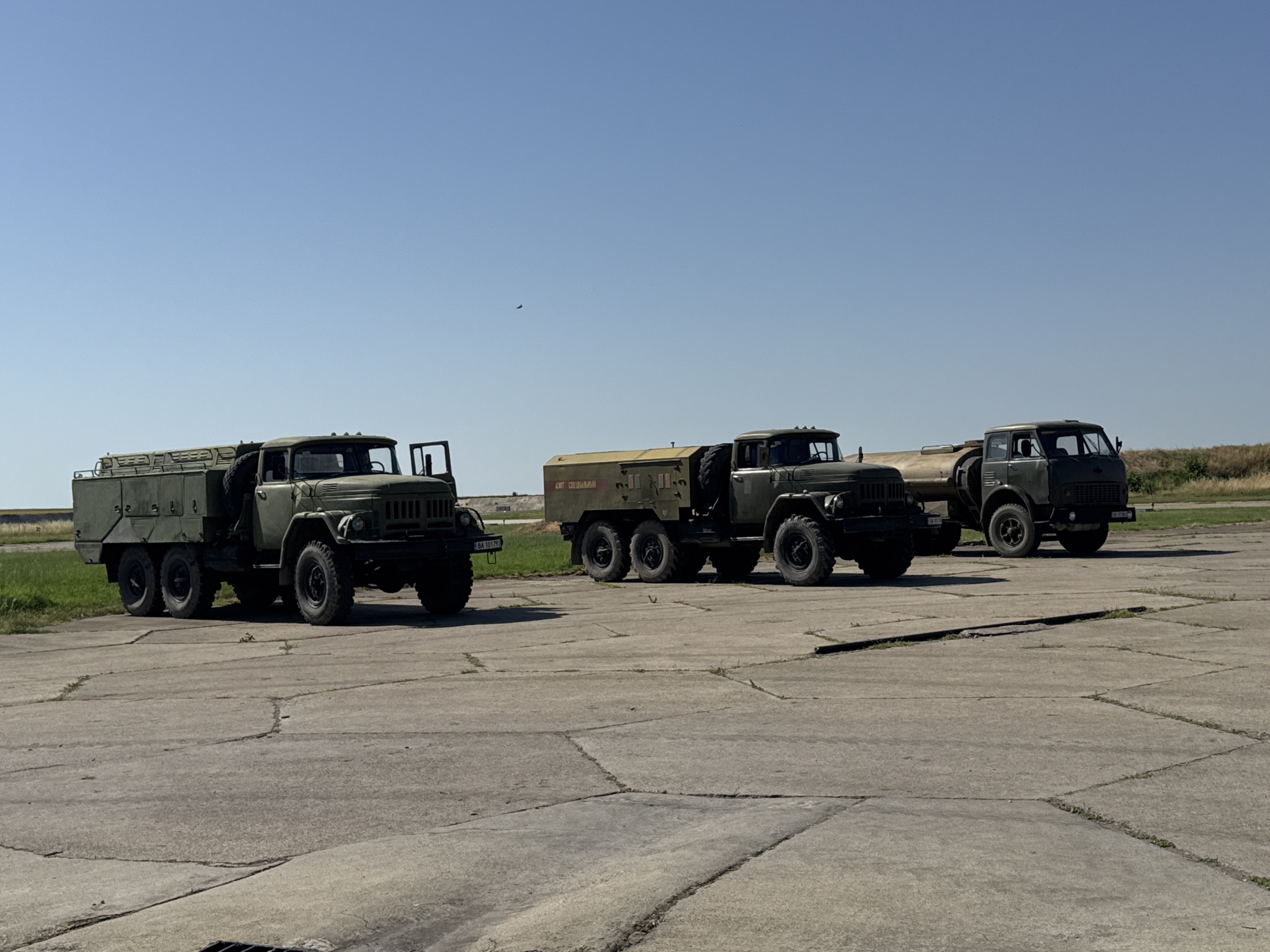 Military aircraft and vehicles at a Bulgarian airfield