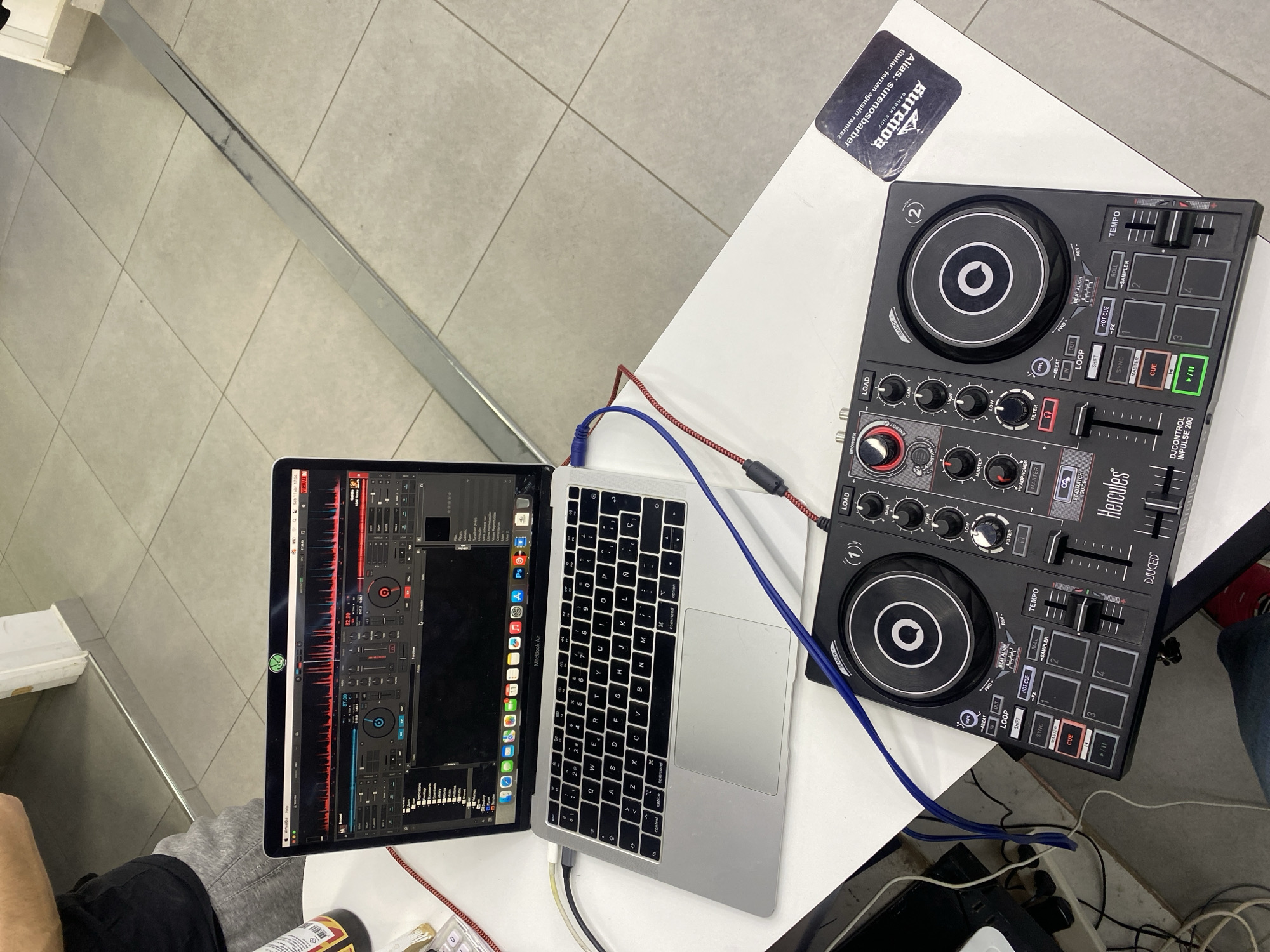 DJ equipment setup observed at Ushuaia barbershop location