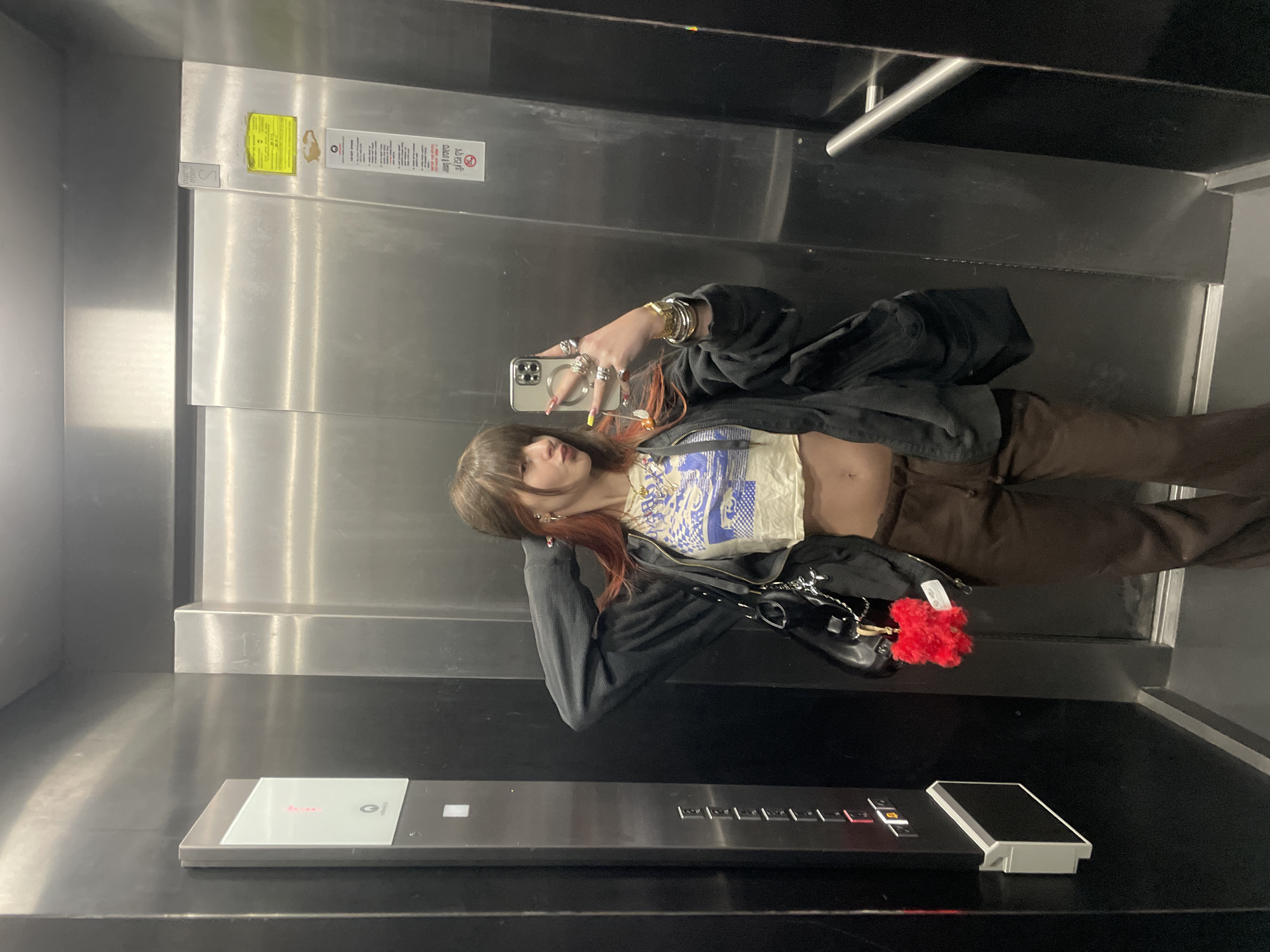 Woman takes elevator selfies in Raanana, Israel