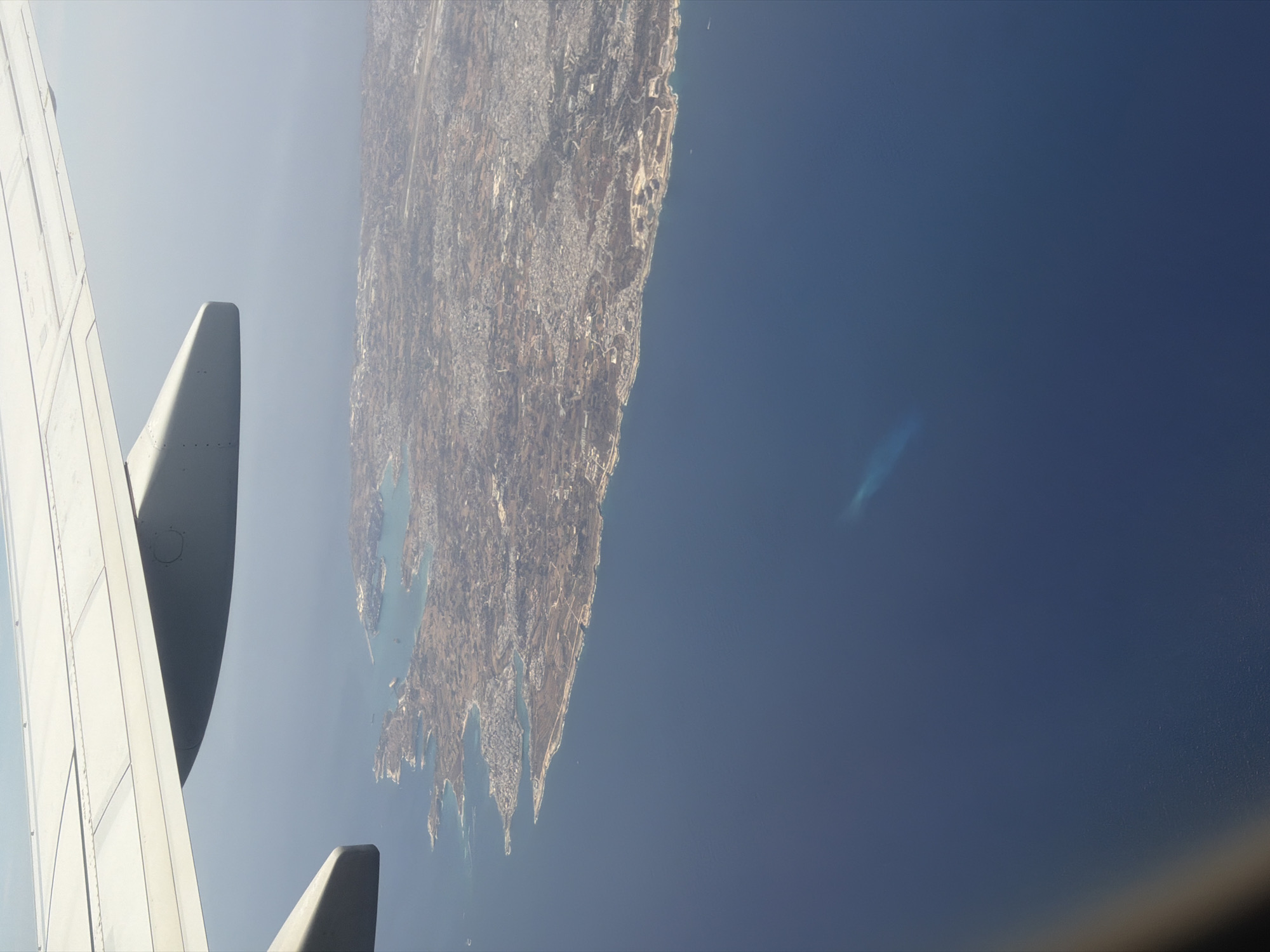 Aircraft lands at Malta airport in wet conditions