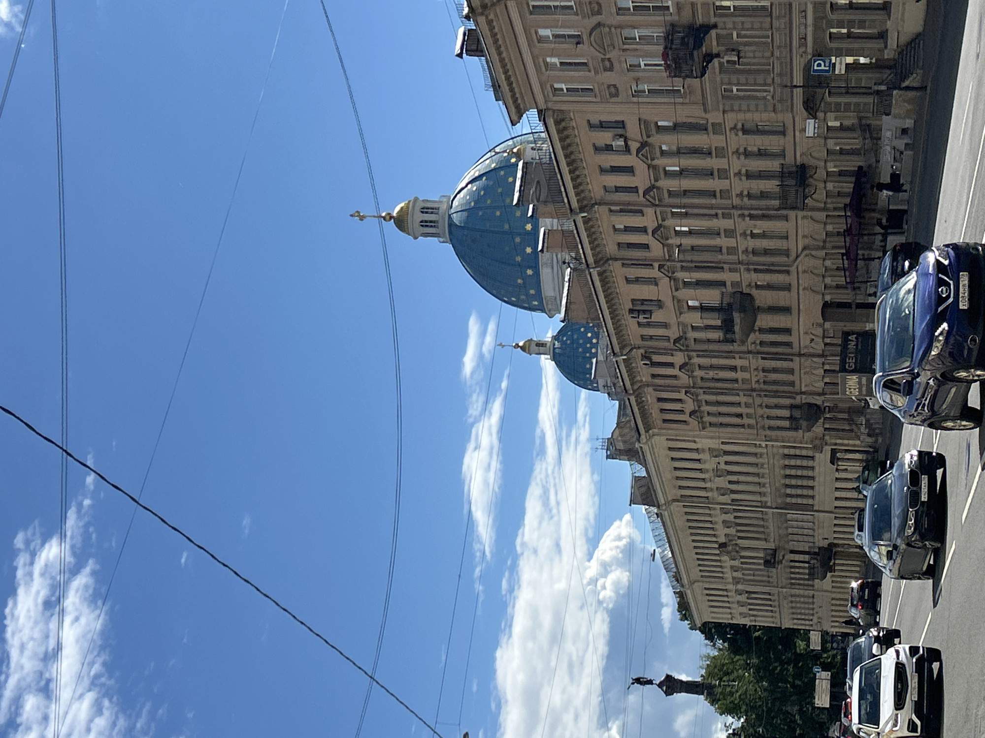 Canal streets, domed churches, and waterfront scenes in a European city