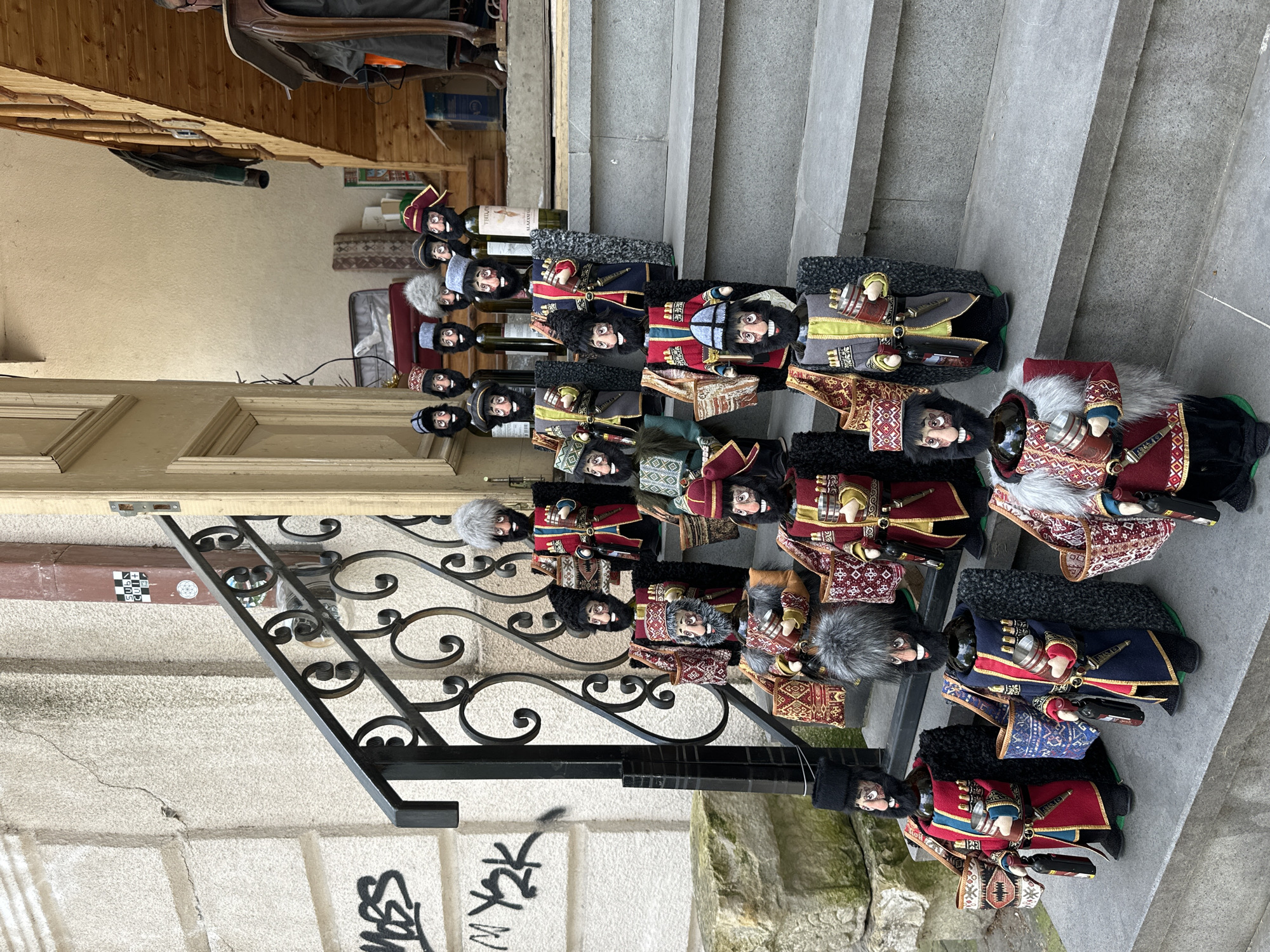 Tourist documents Georgian flags, culture, architecture in Tbilisi old town
