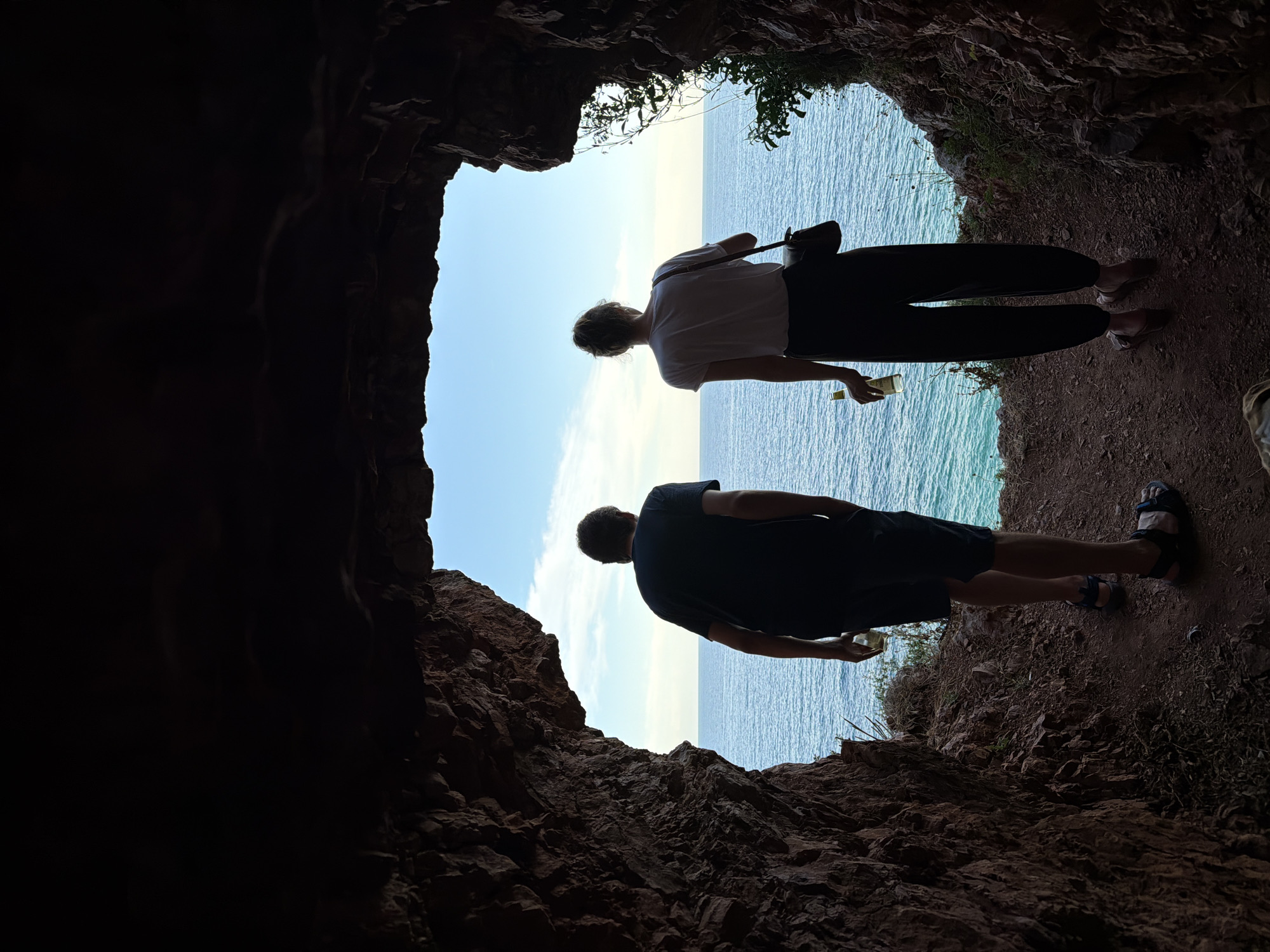 Exploring a sea cave and coastal overlook in Petrovac, Montenegro