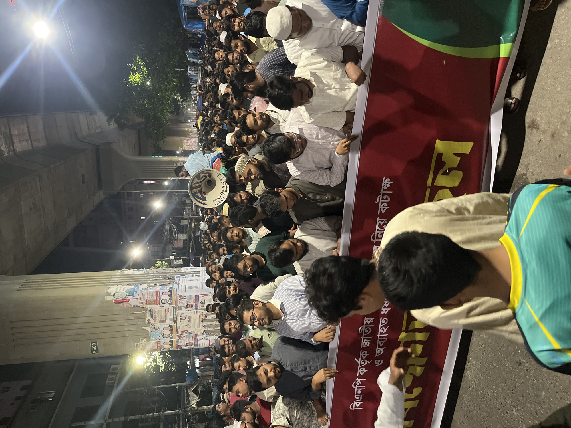 Political rally with revolution banners in Dhaka streets