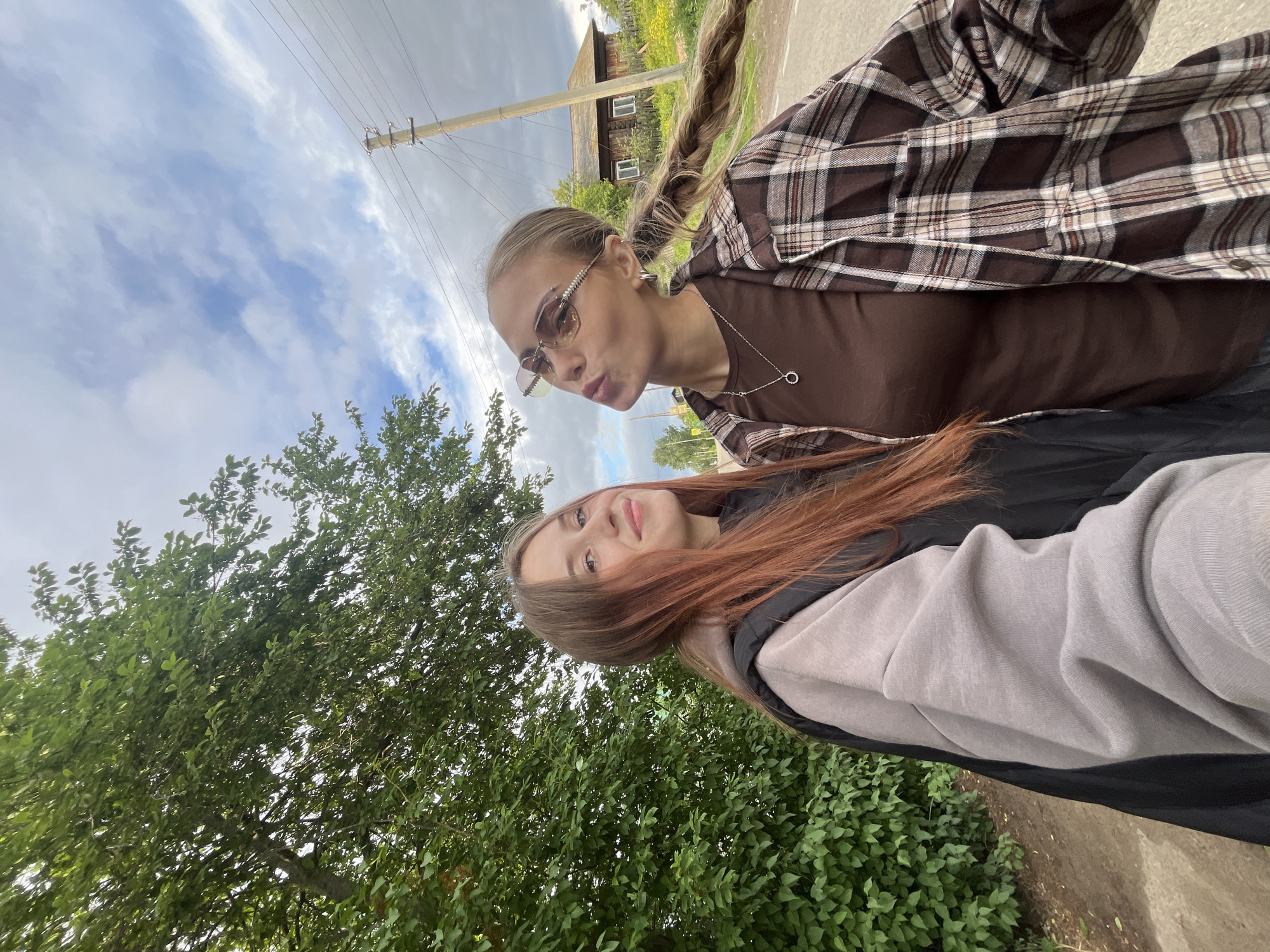 Casual family photos captured during outdoor gathering in rural Russia