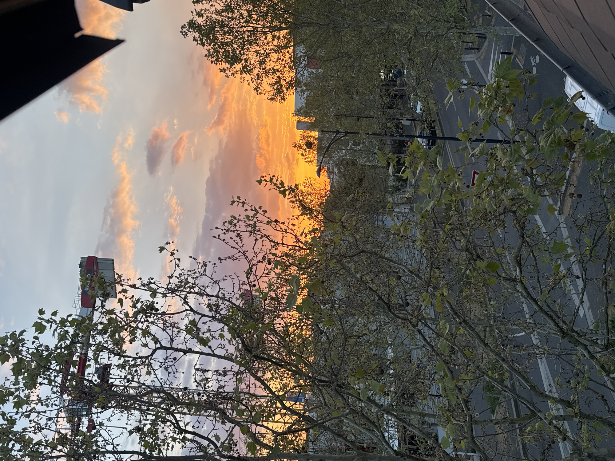 Sunset colors observed over Champigny-sur-Marne street scene