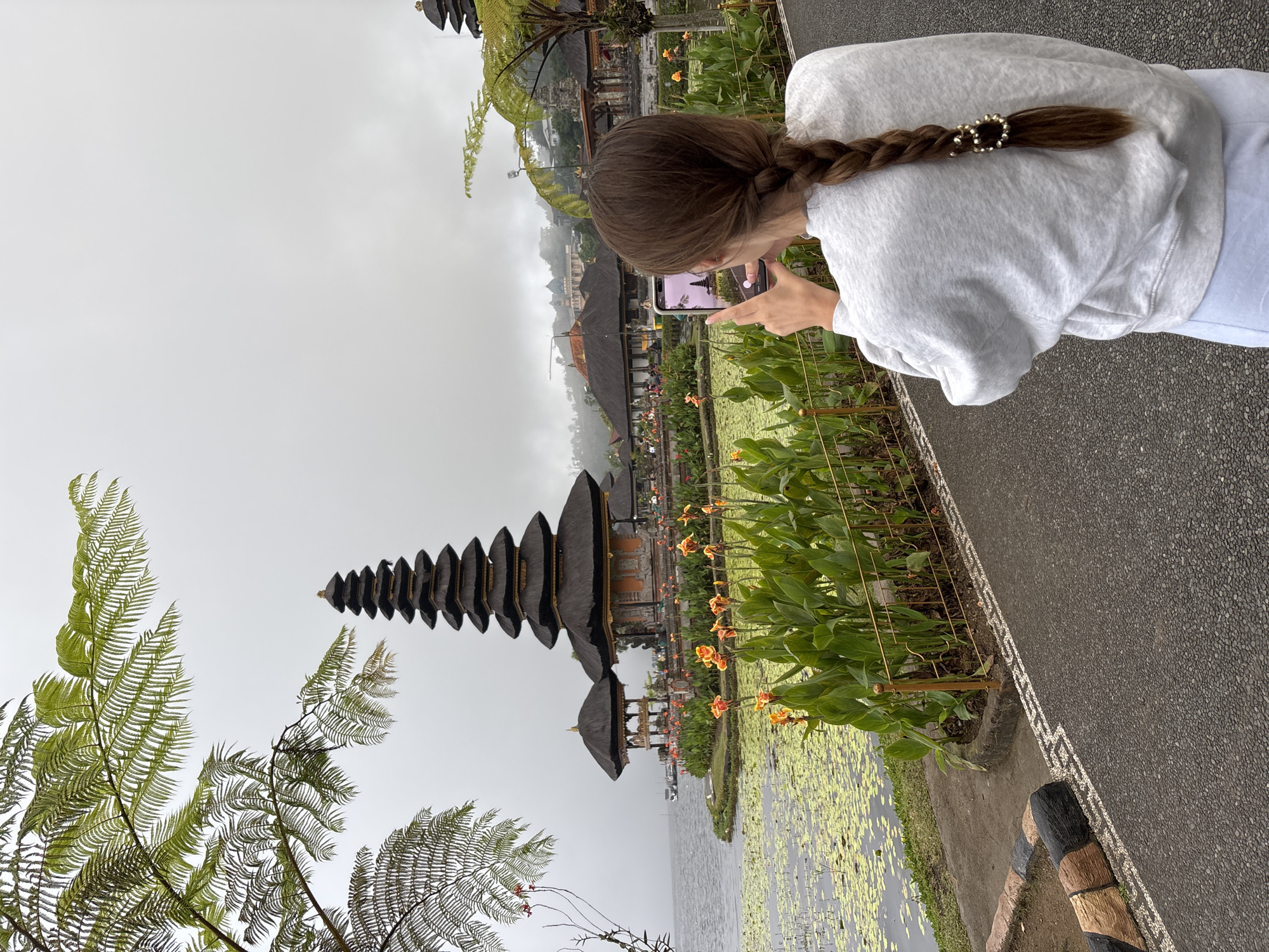 Tourists visit iconic Ulun Danu Beratan Temple in Bali