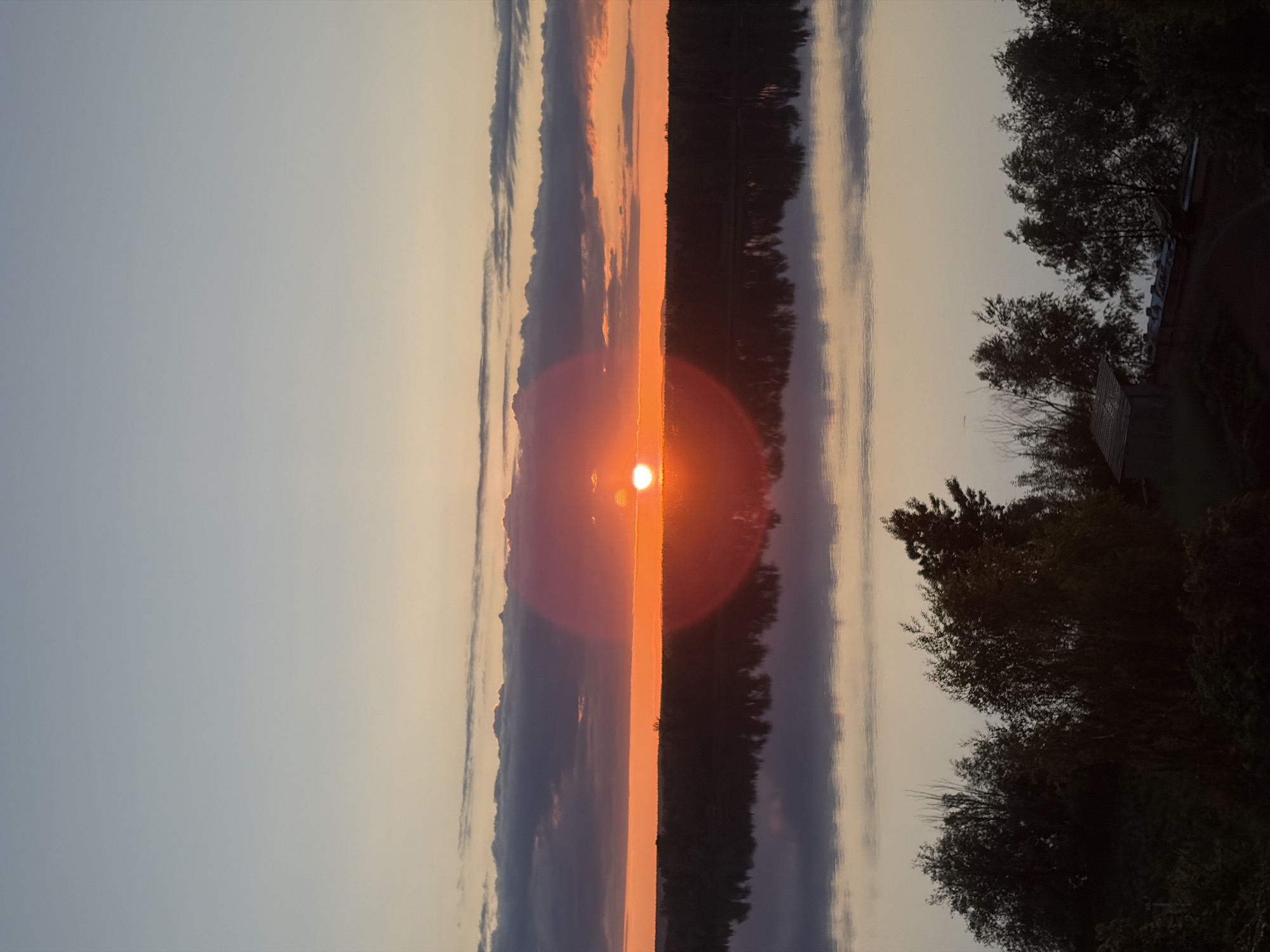 Sunset captured over water in Ольховка, Russia