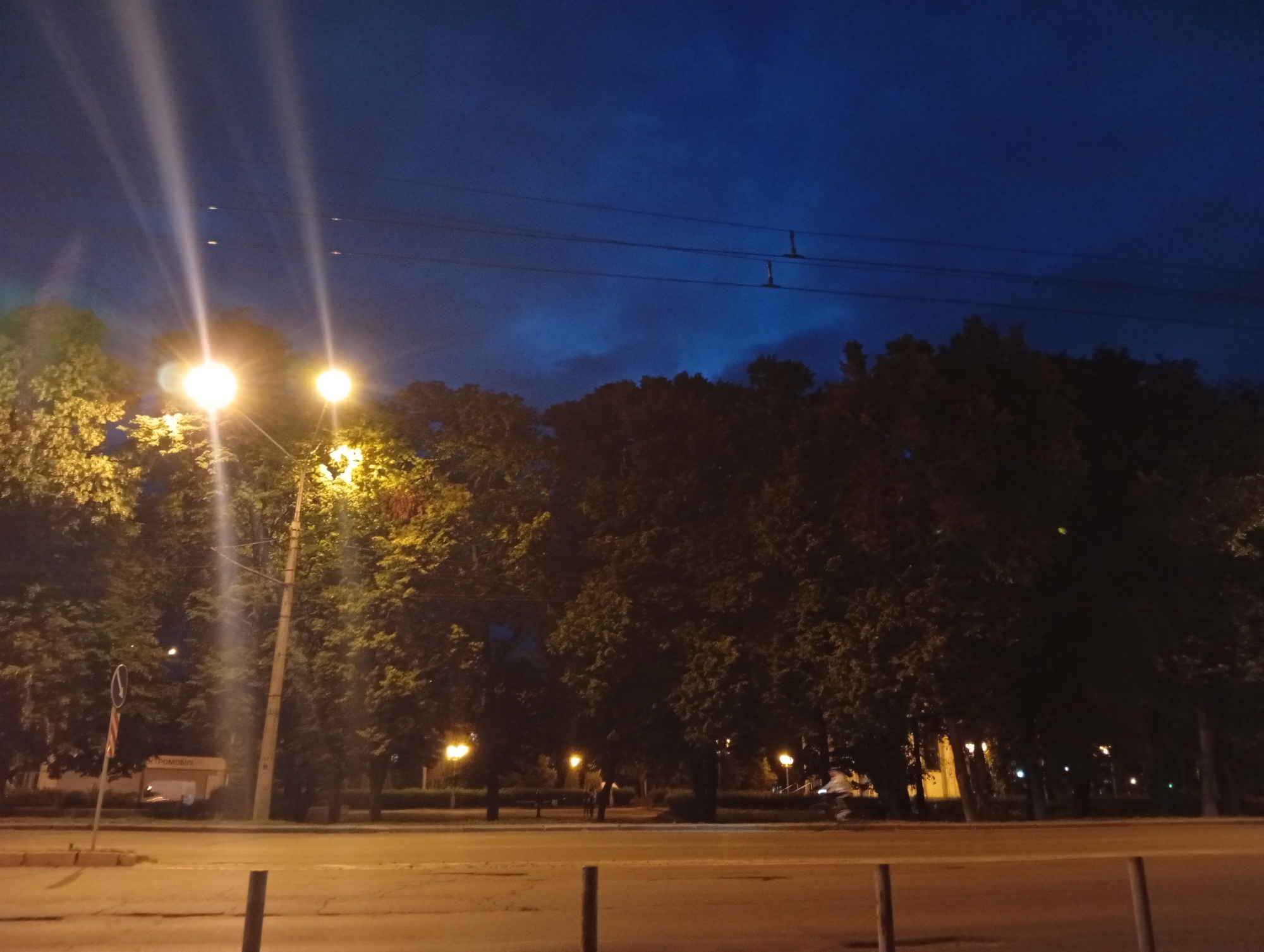 Evening stroll through illuminated Poltava streets and storefronts