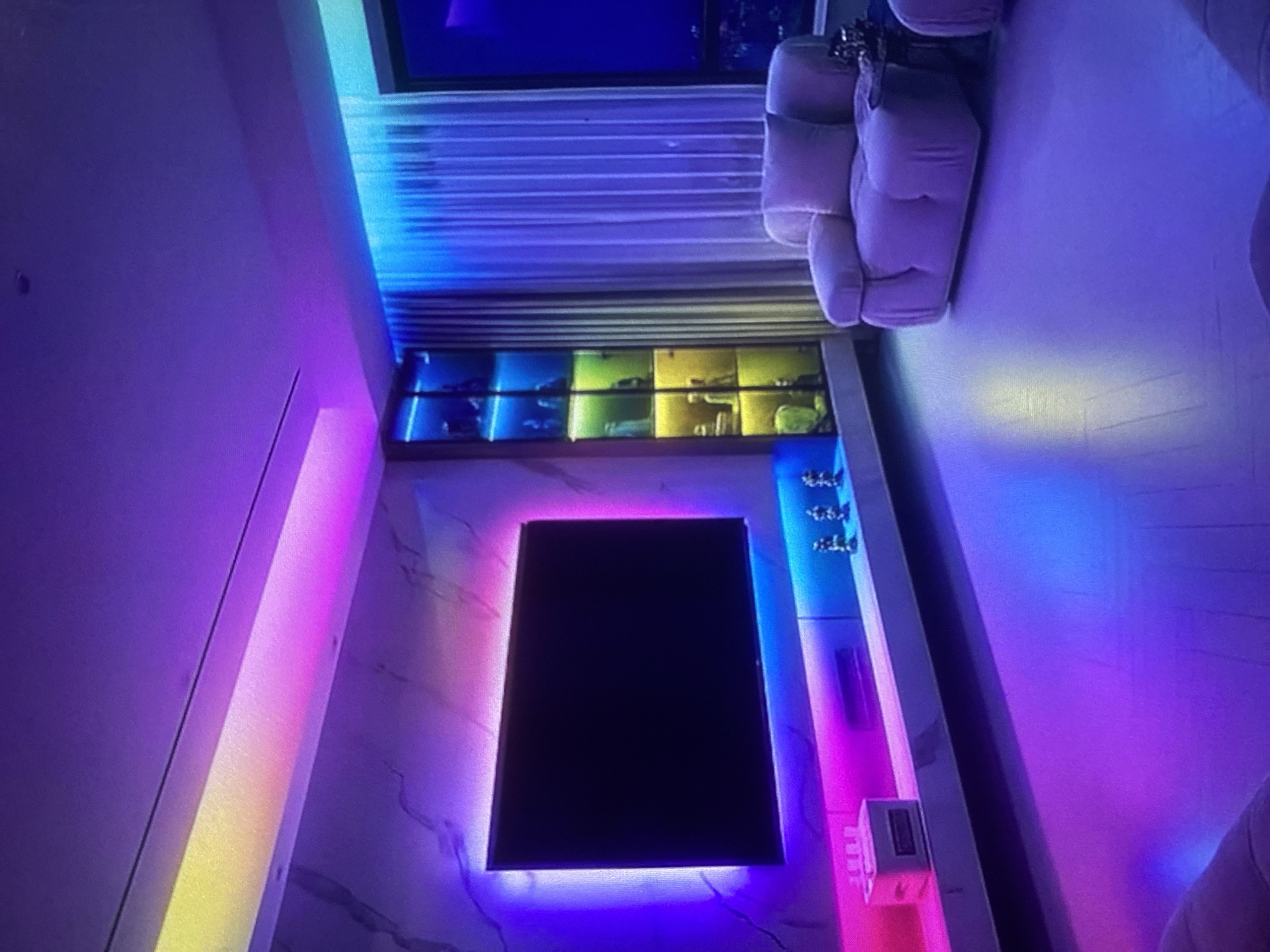 LED-lit interior with television documented in Lhokseumawe