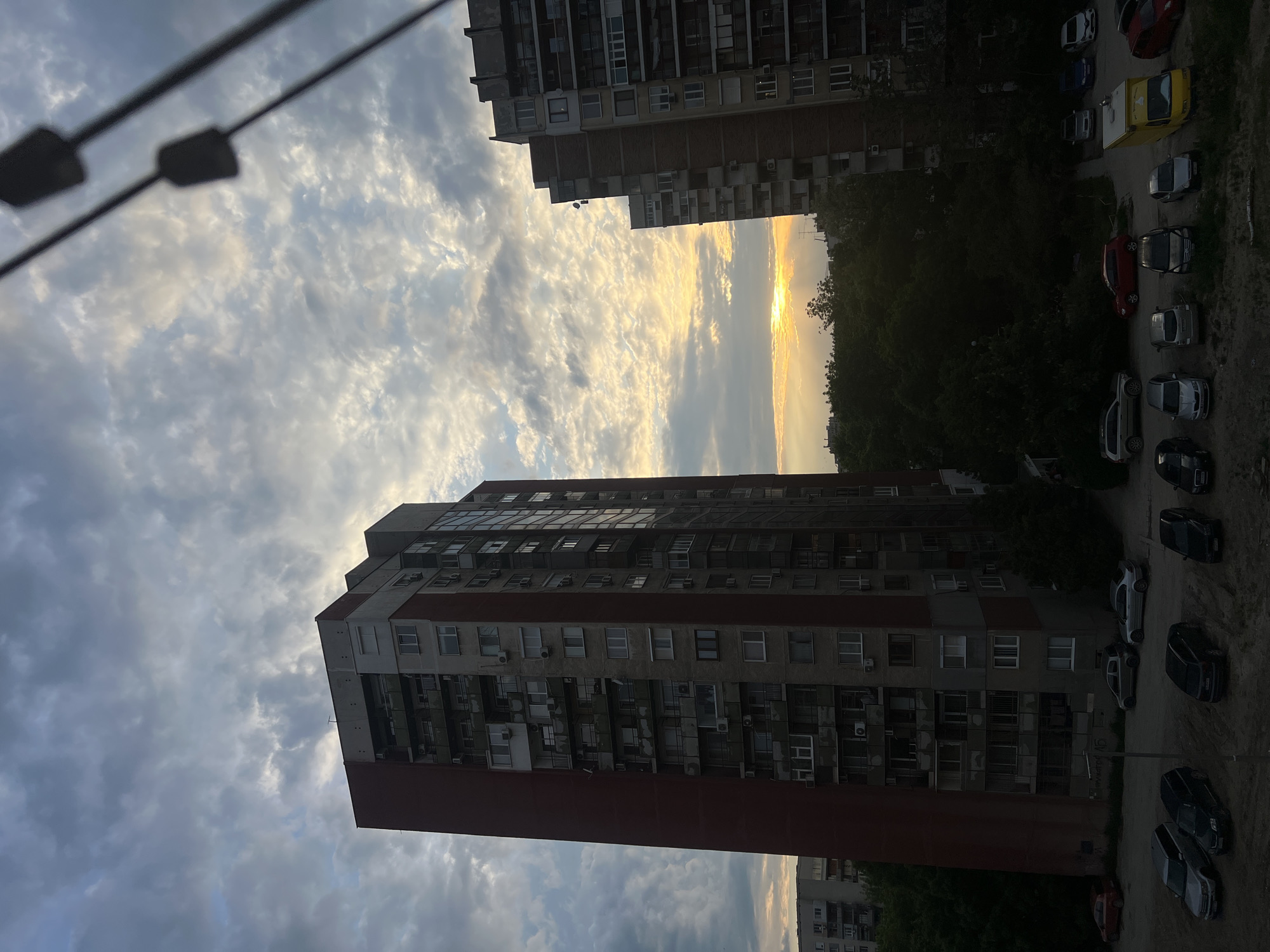 Urban view captured from high-rise overlooking apartment buildings