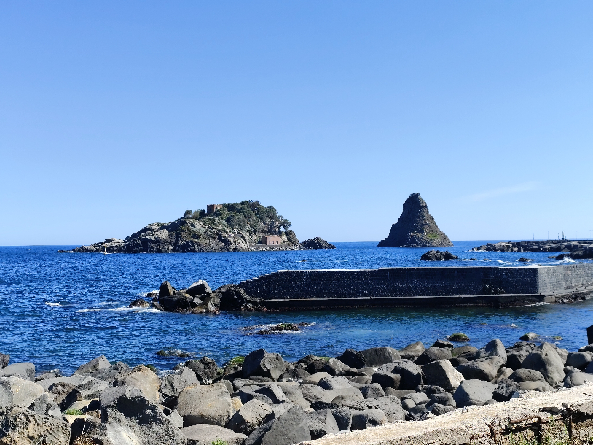 Coastal moments captured in Aci Castello, Italy